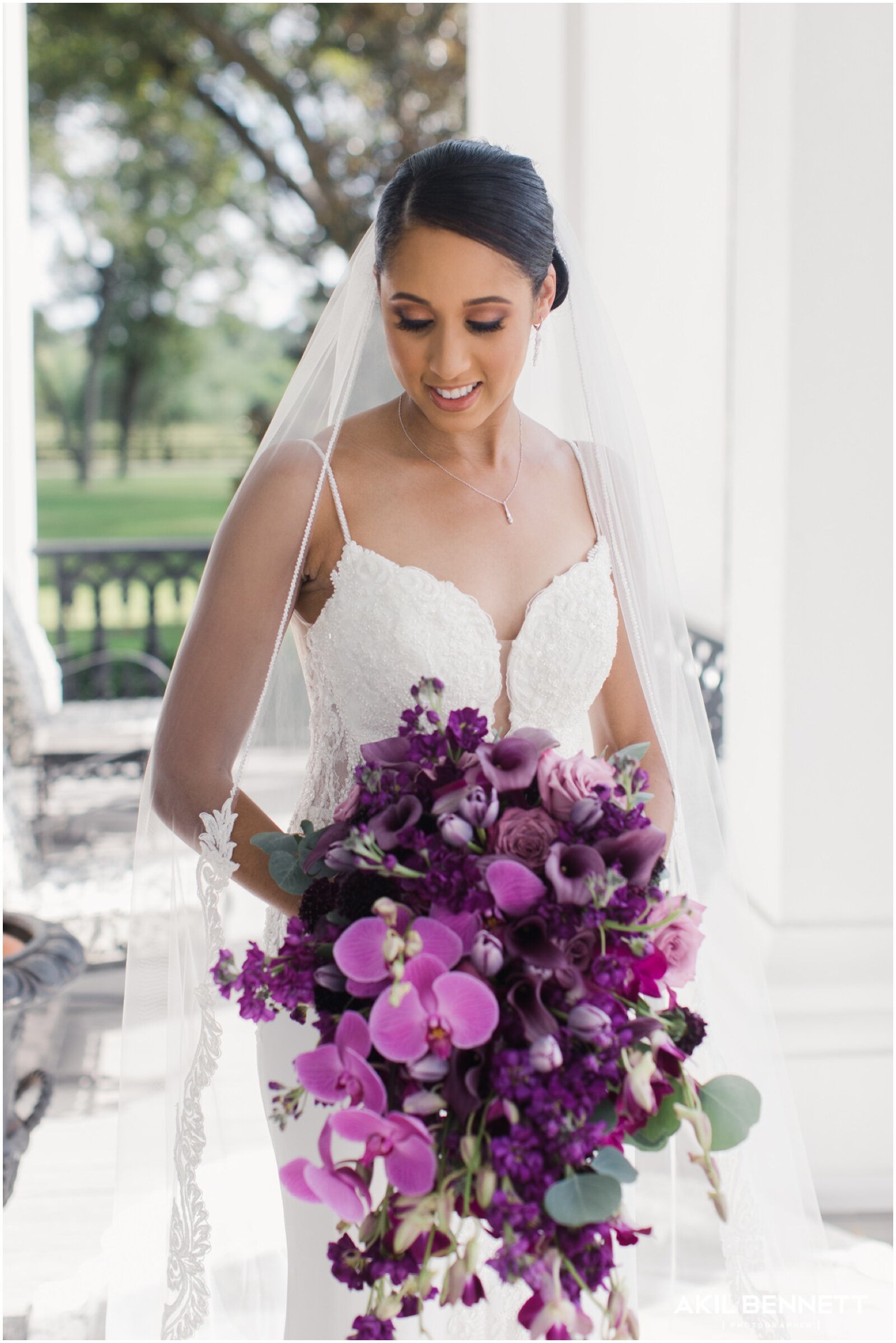  bride holding her lavender bridal bouquet 