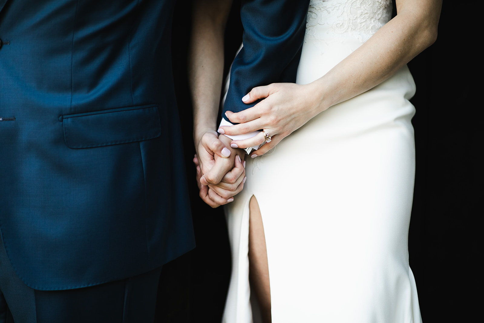  bride and groom holding hands portrait 
