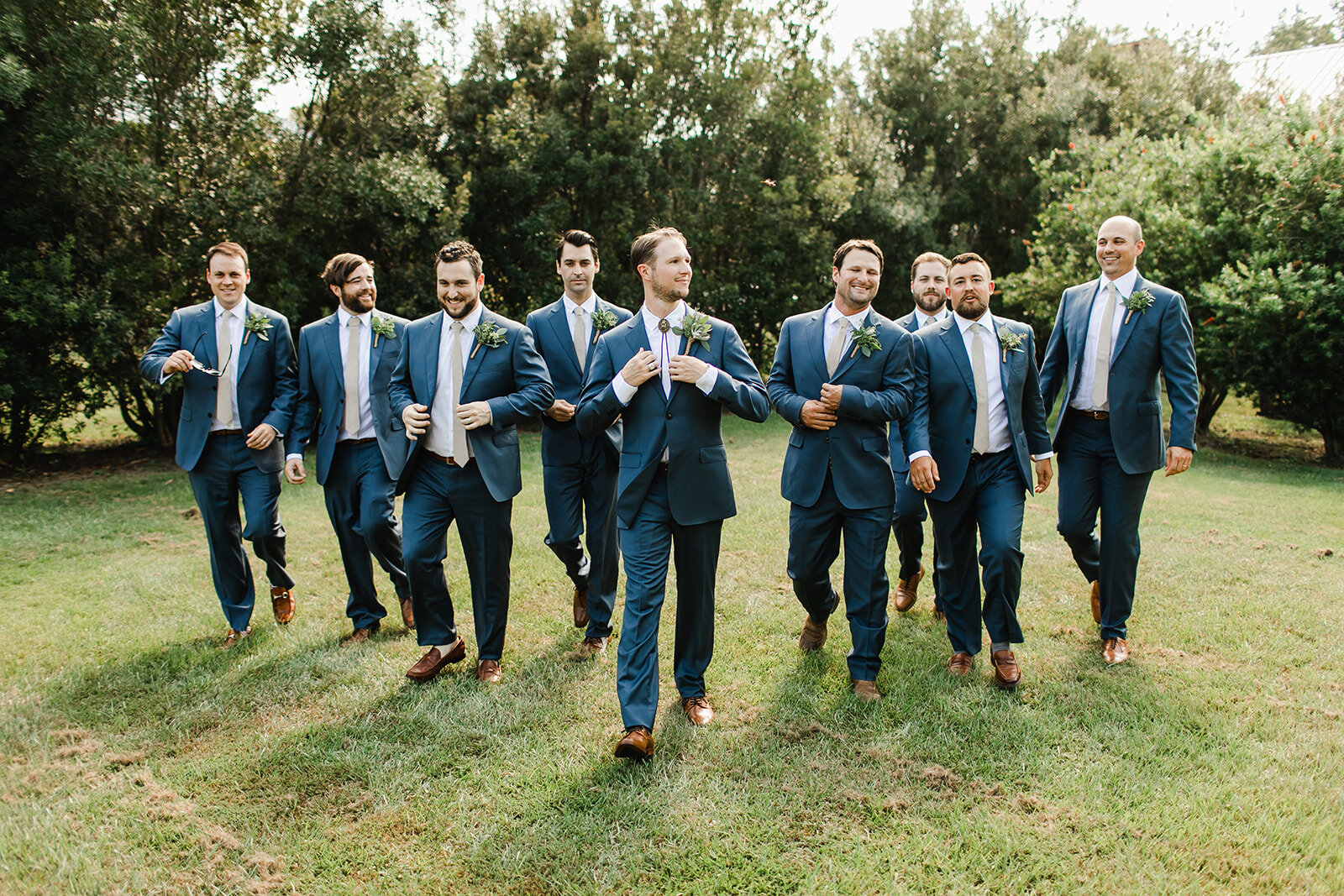  groom and groomsmen in blue suits 