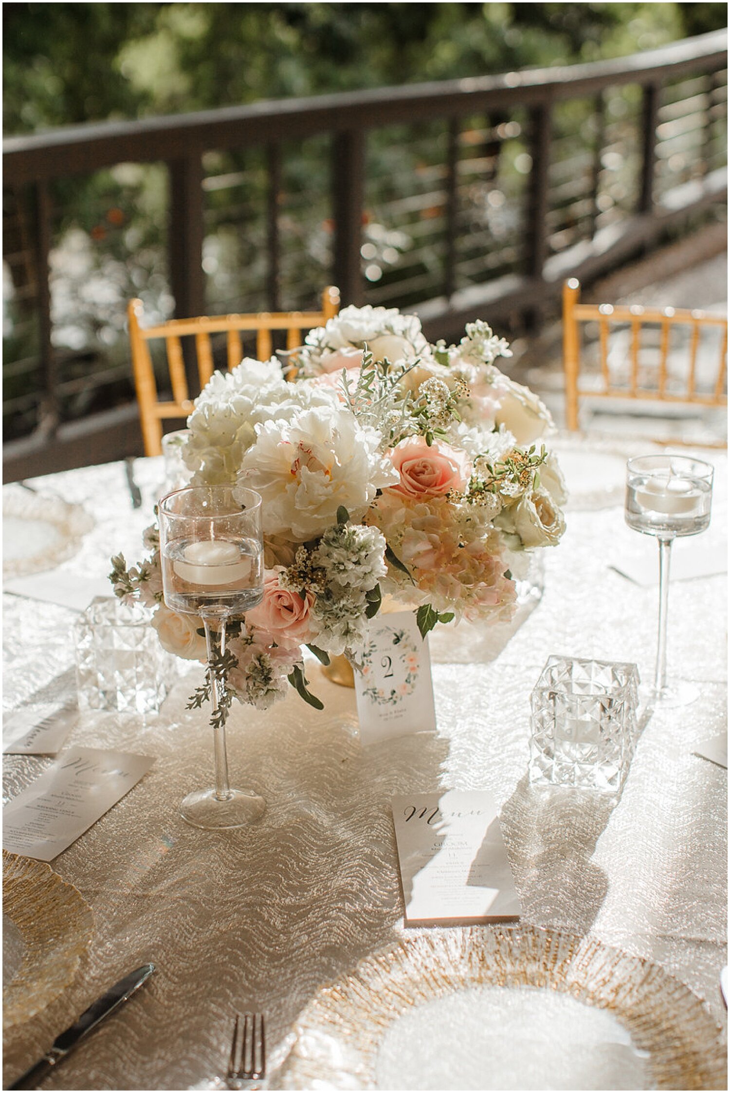  white and peach wedding floral centerpiece 