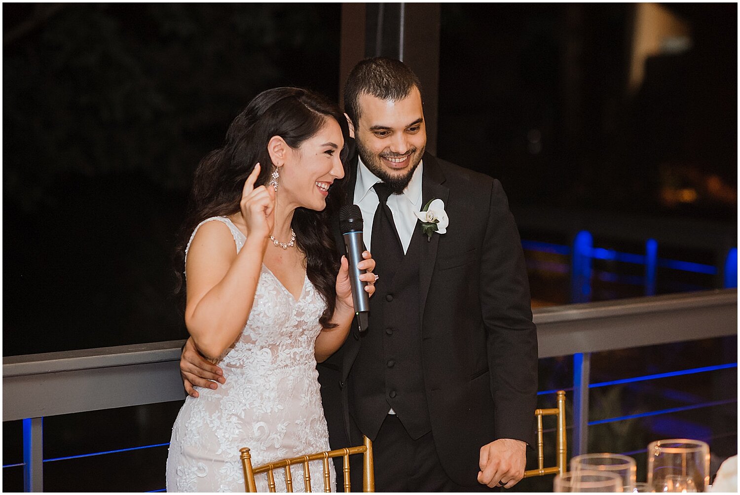  bride and groom making a toast  