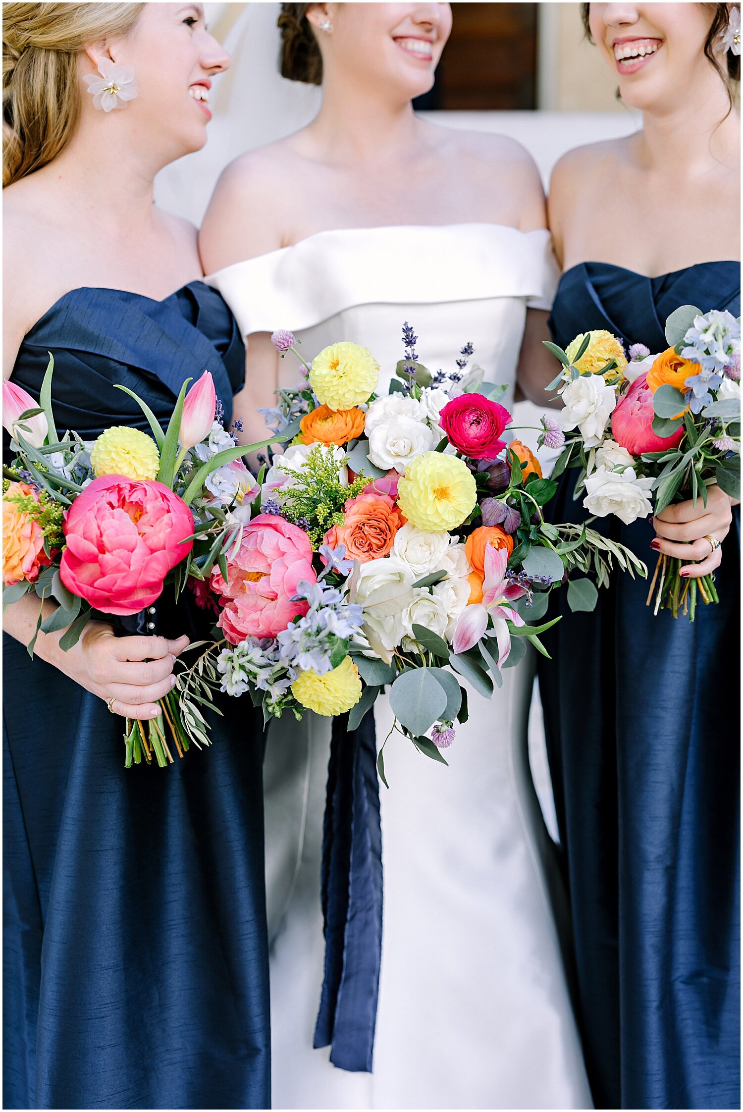  bride and bridesmaids colorful wedding bouquets 