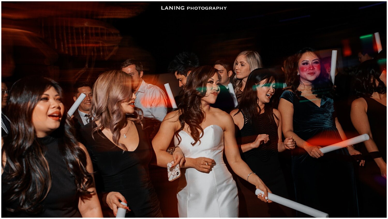  bride dancing with their friends in houston wedding 