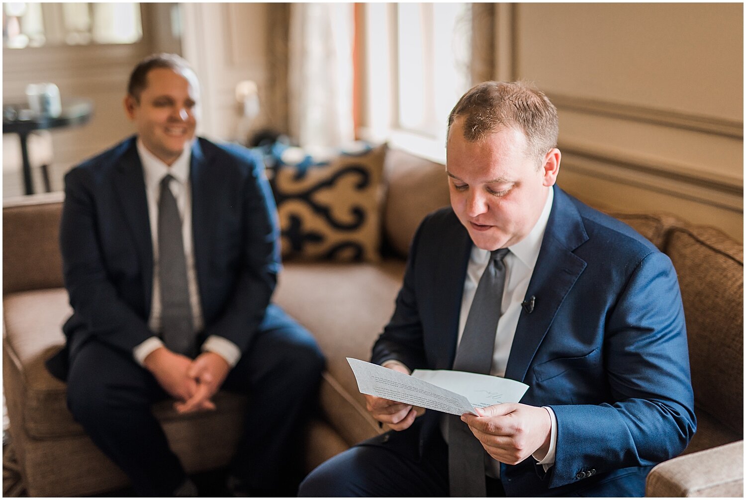  grooms reading letters from each other 