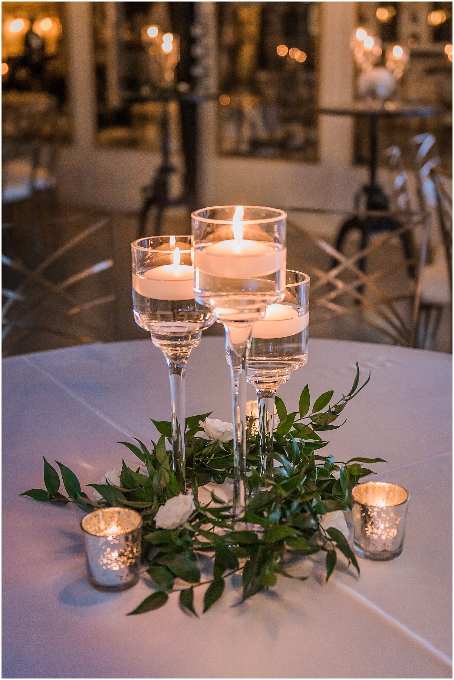 romantic wedding centerpieces with candles and greenery 