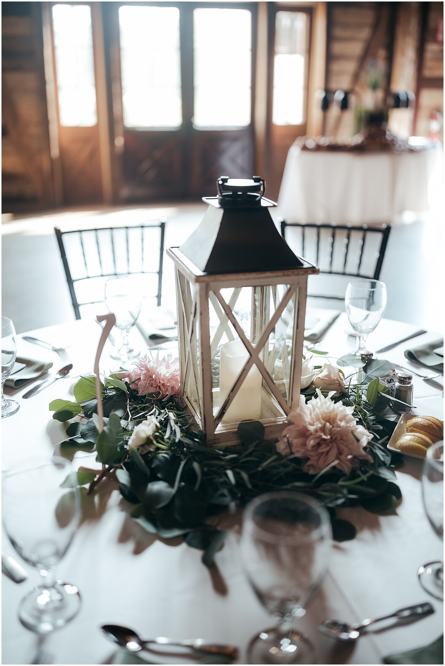  simple lantern and greenery centerpiece 