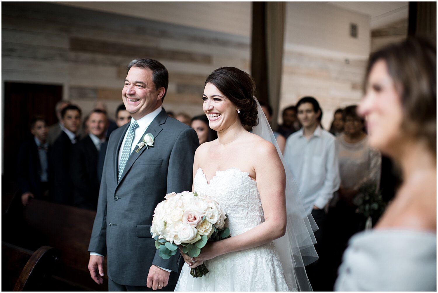  father and bride walking down the aisle 