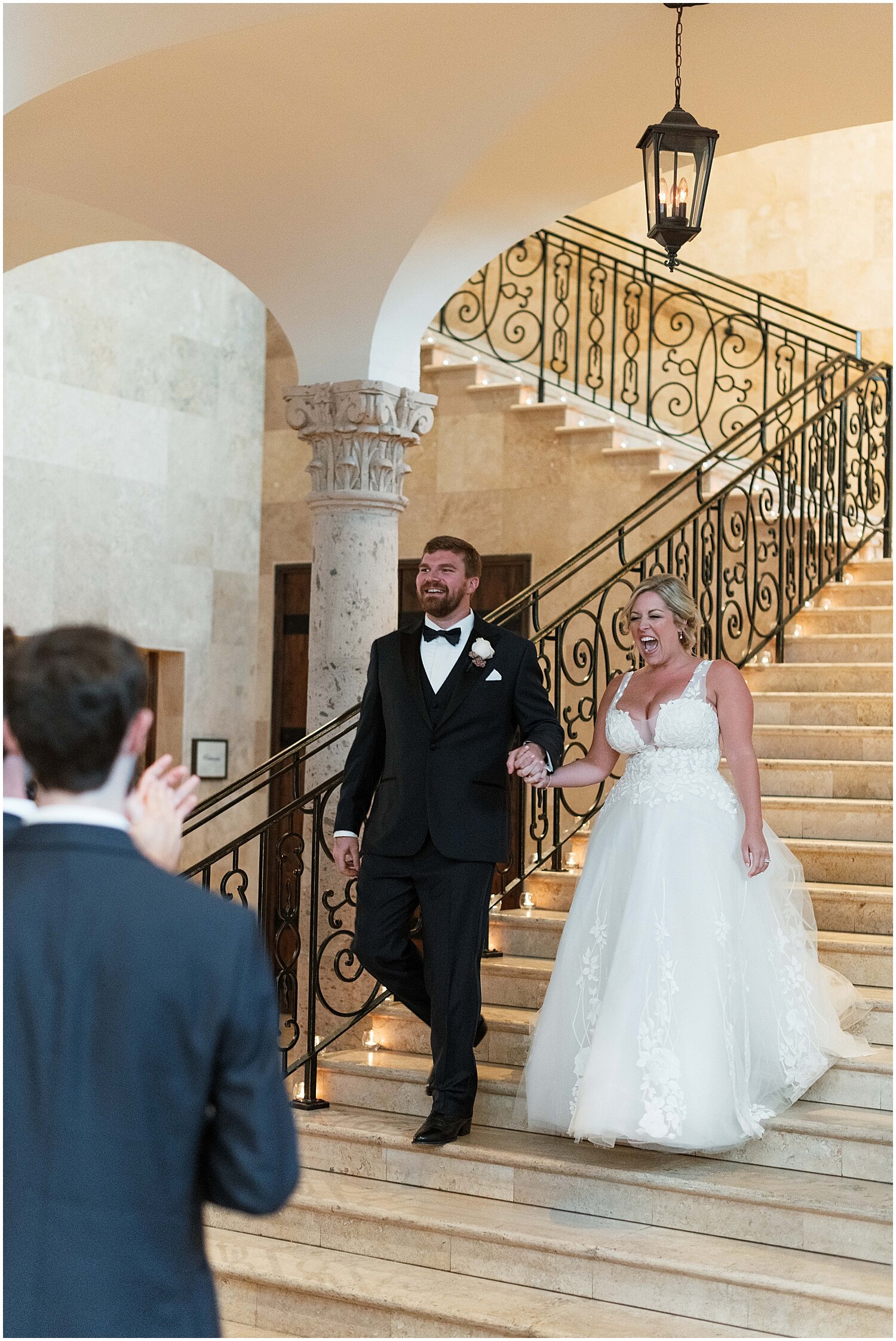  bride and groom’s grand entrance to their reception 