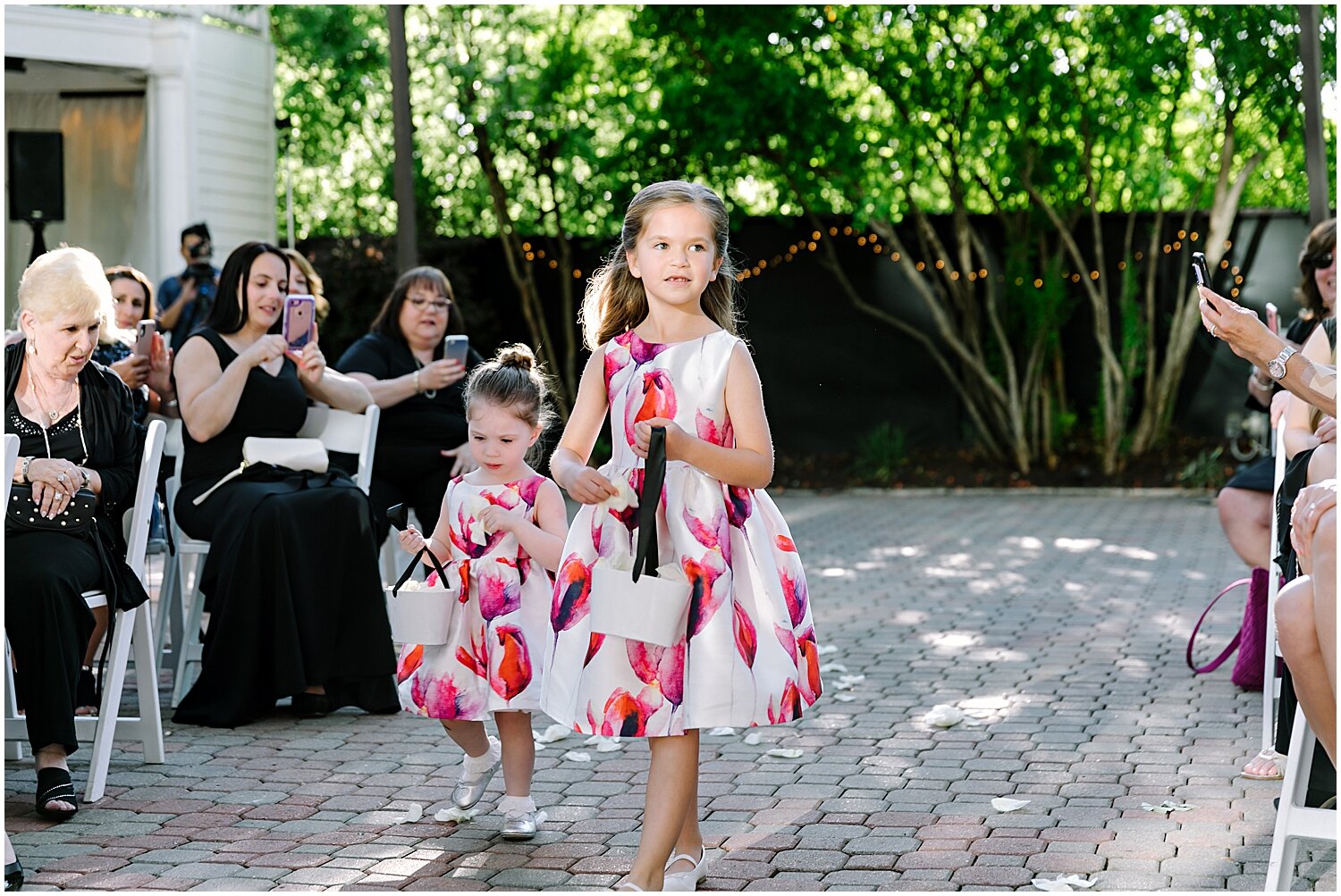  Flower girls walking down the aisle 