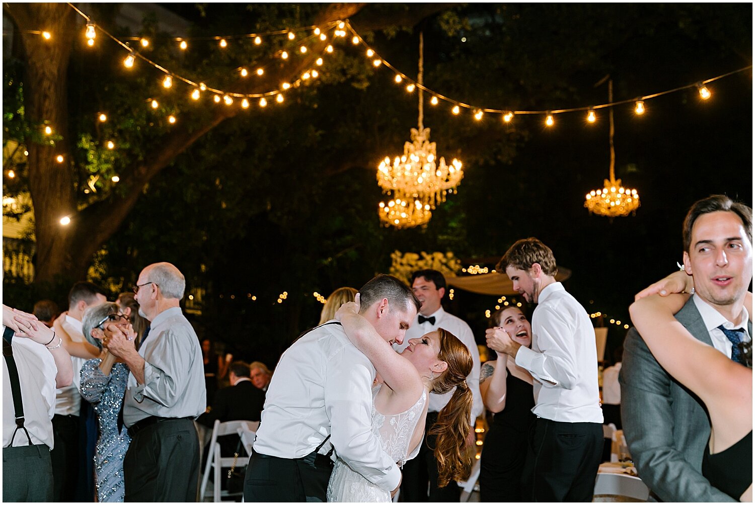  bride and groom dancing during their wedding reception 