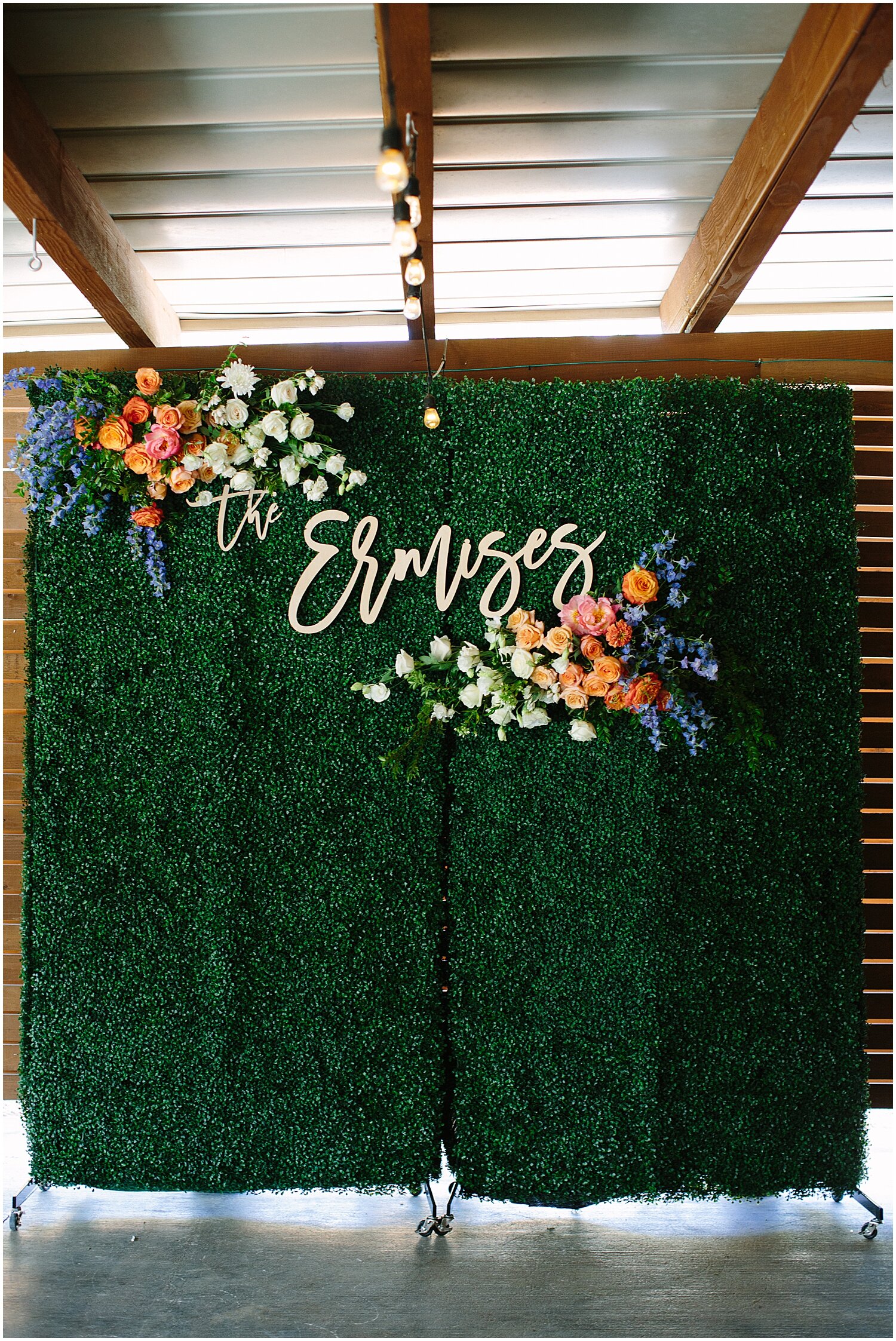  greenery backdrop and floral decor  