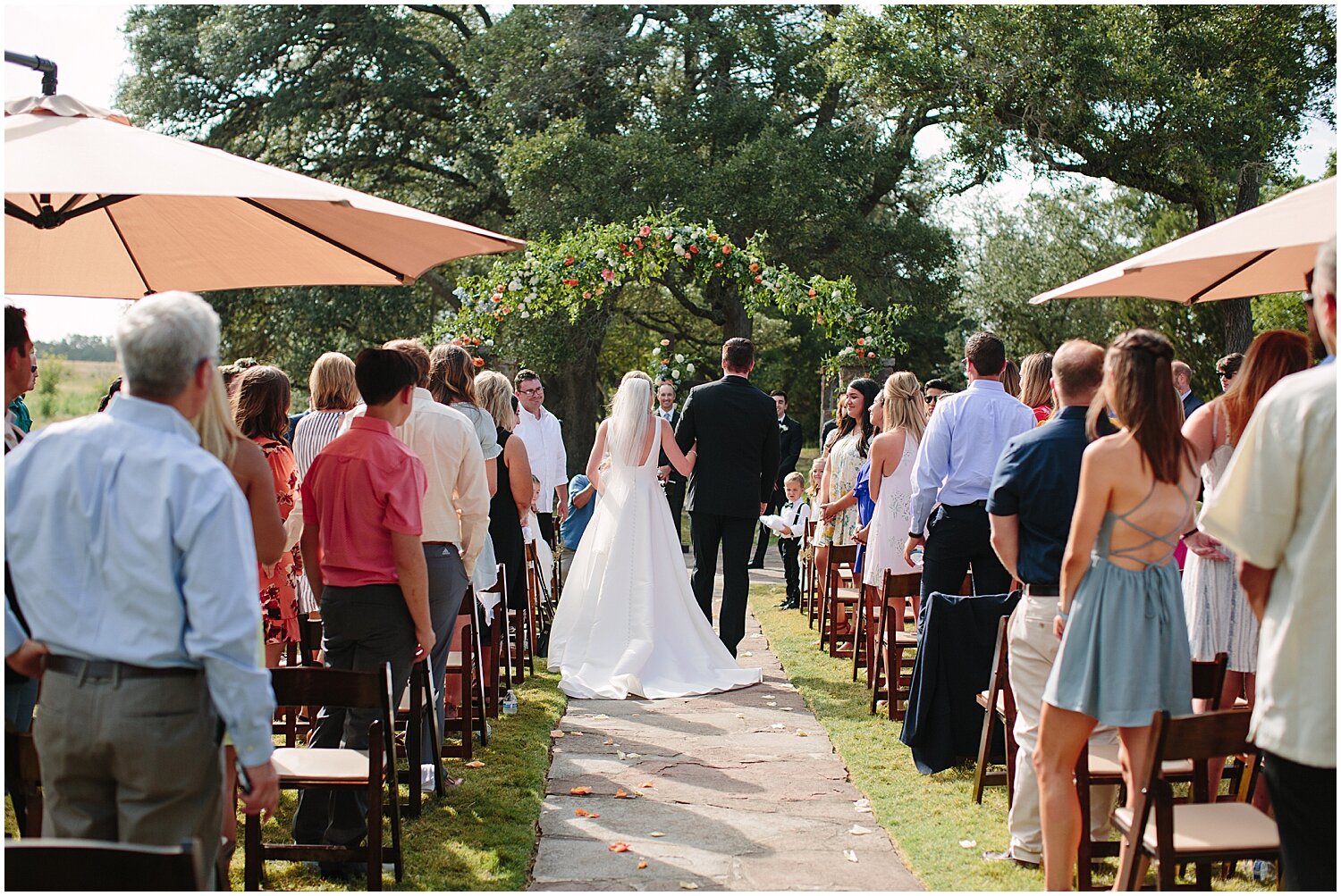  father and bride walking down the aisle in Austin Texas 