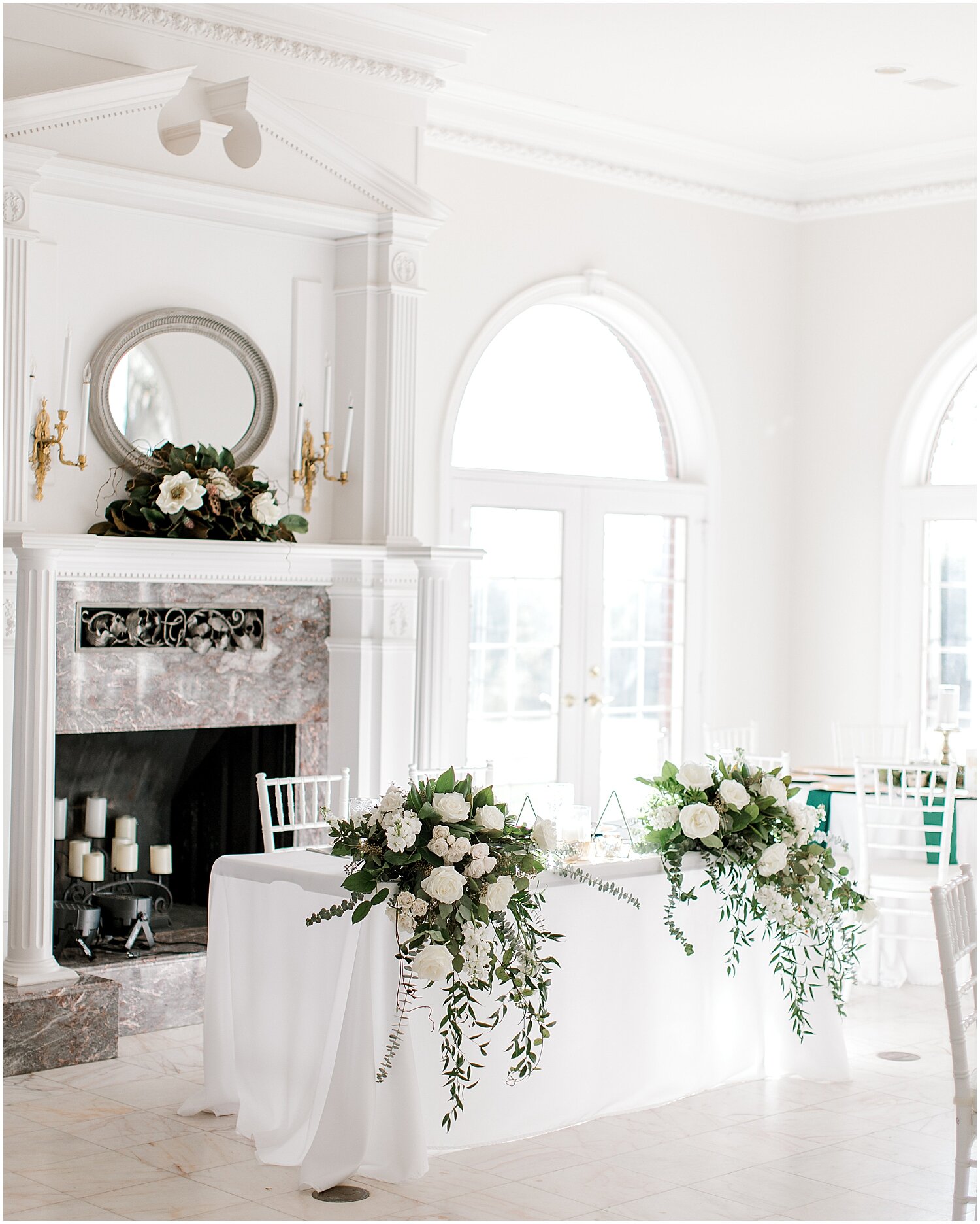  sweetheart table with white with greenery decor 