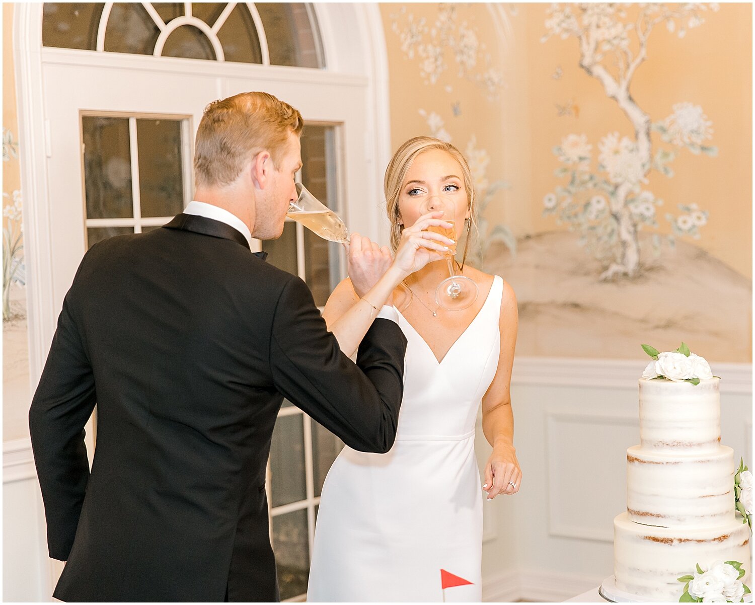  bride and groom drink champagne 