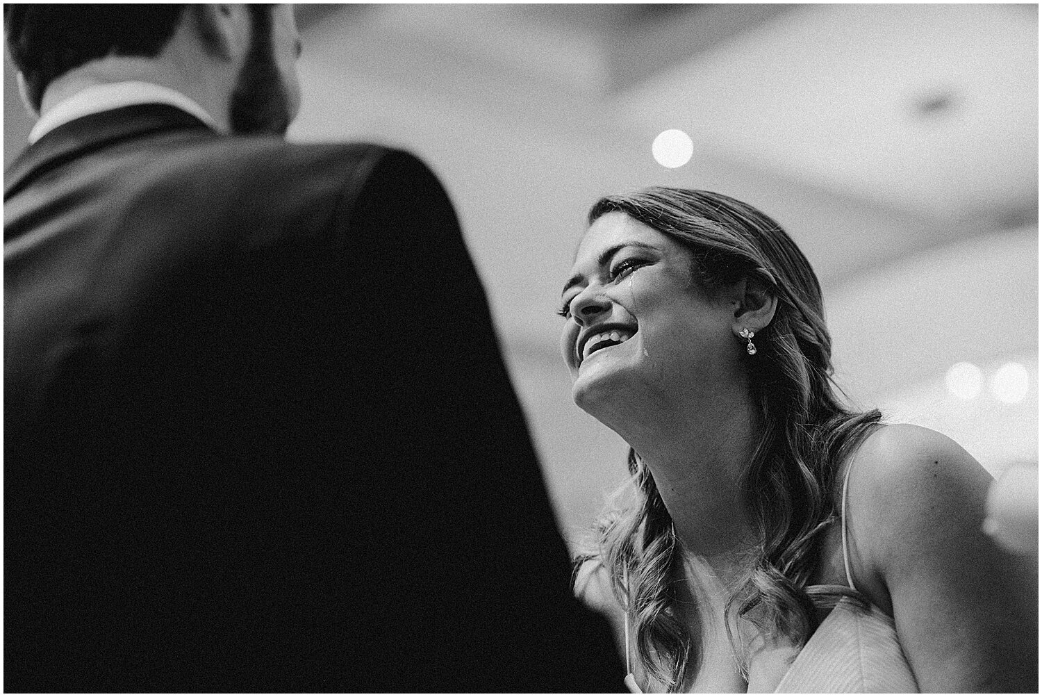  bride smiling during her wedding ceremony in Houston 