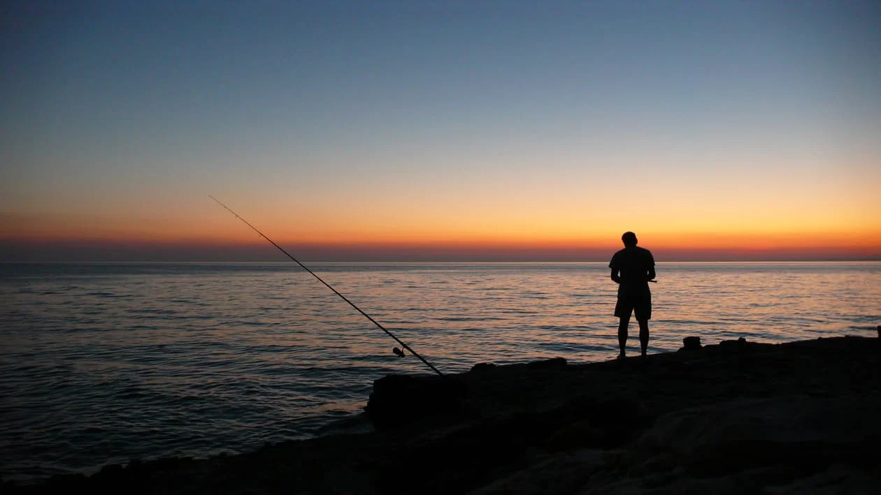 sunset-sea-angler-sun-65615.jpeg