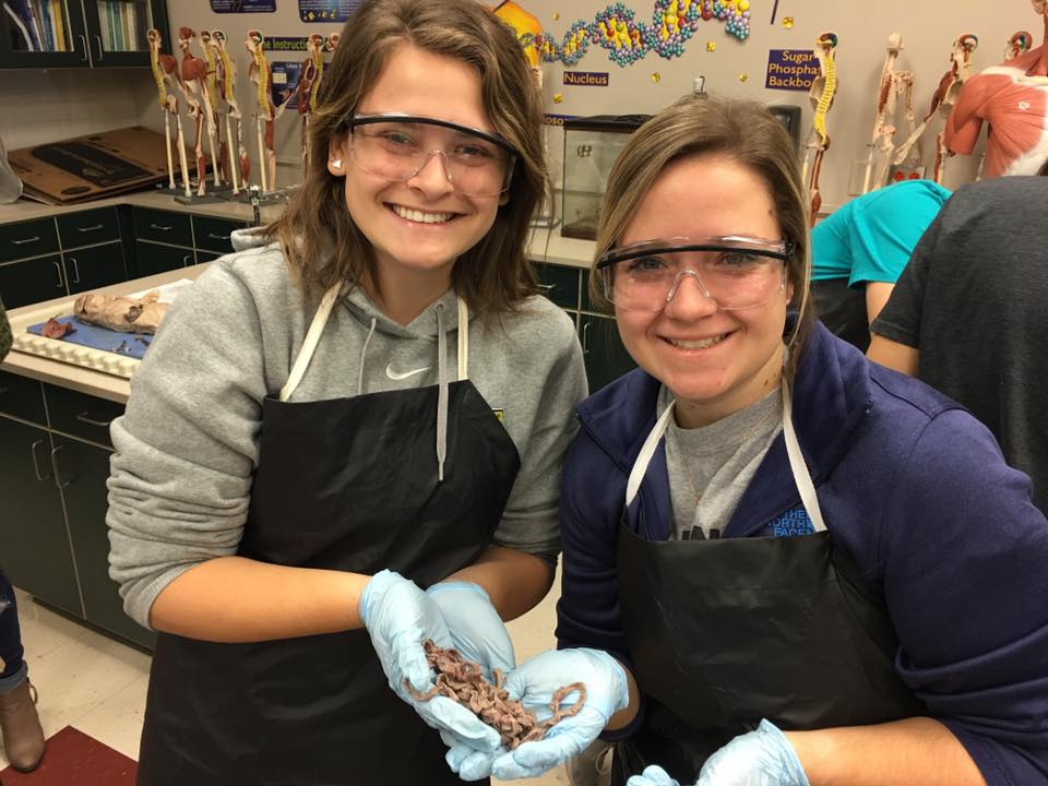 Students holding part of their dissection lab