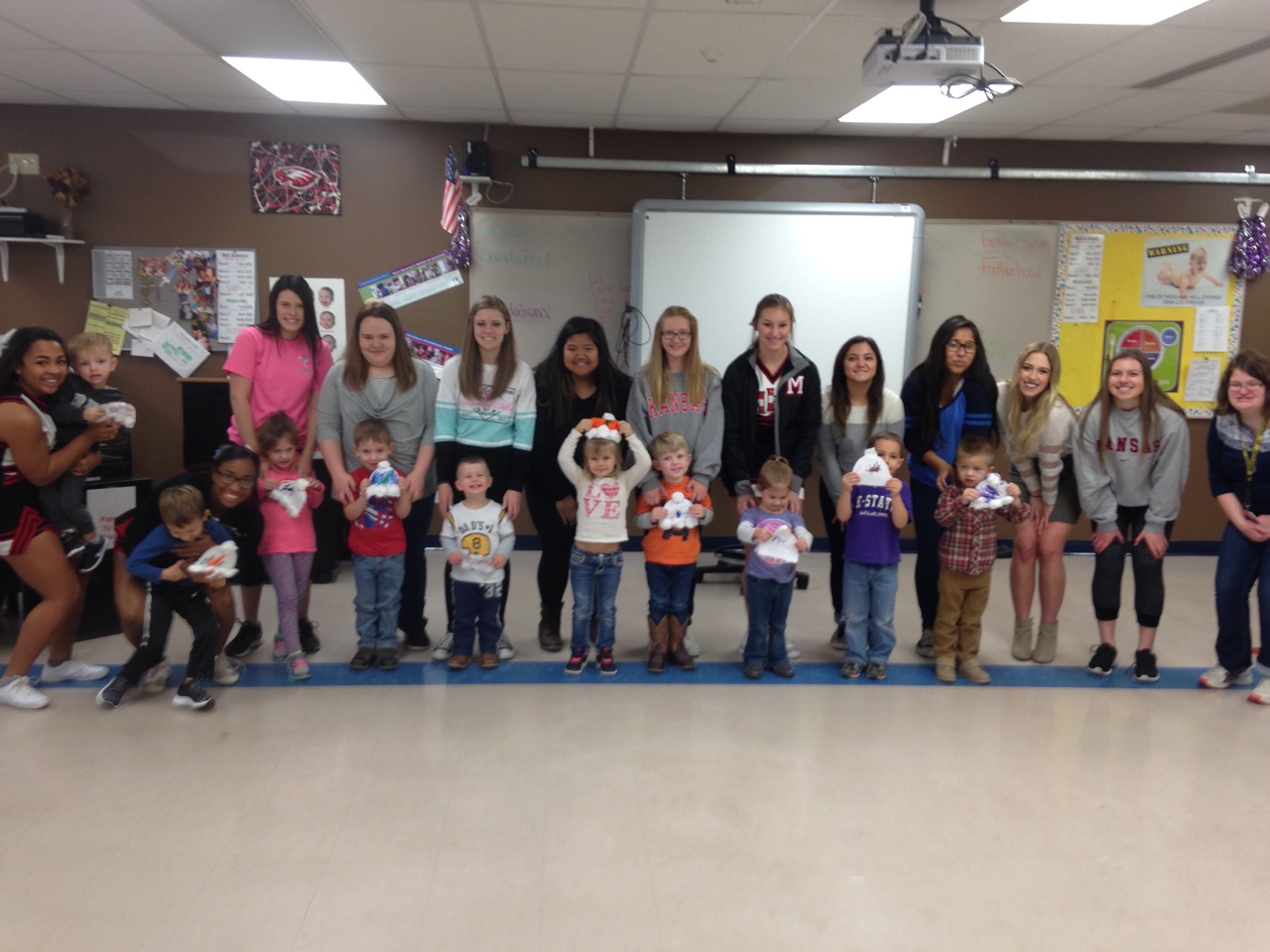 Maize High students and their new friends at a Maize elementary school.