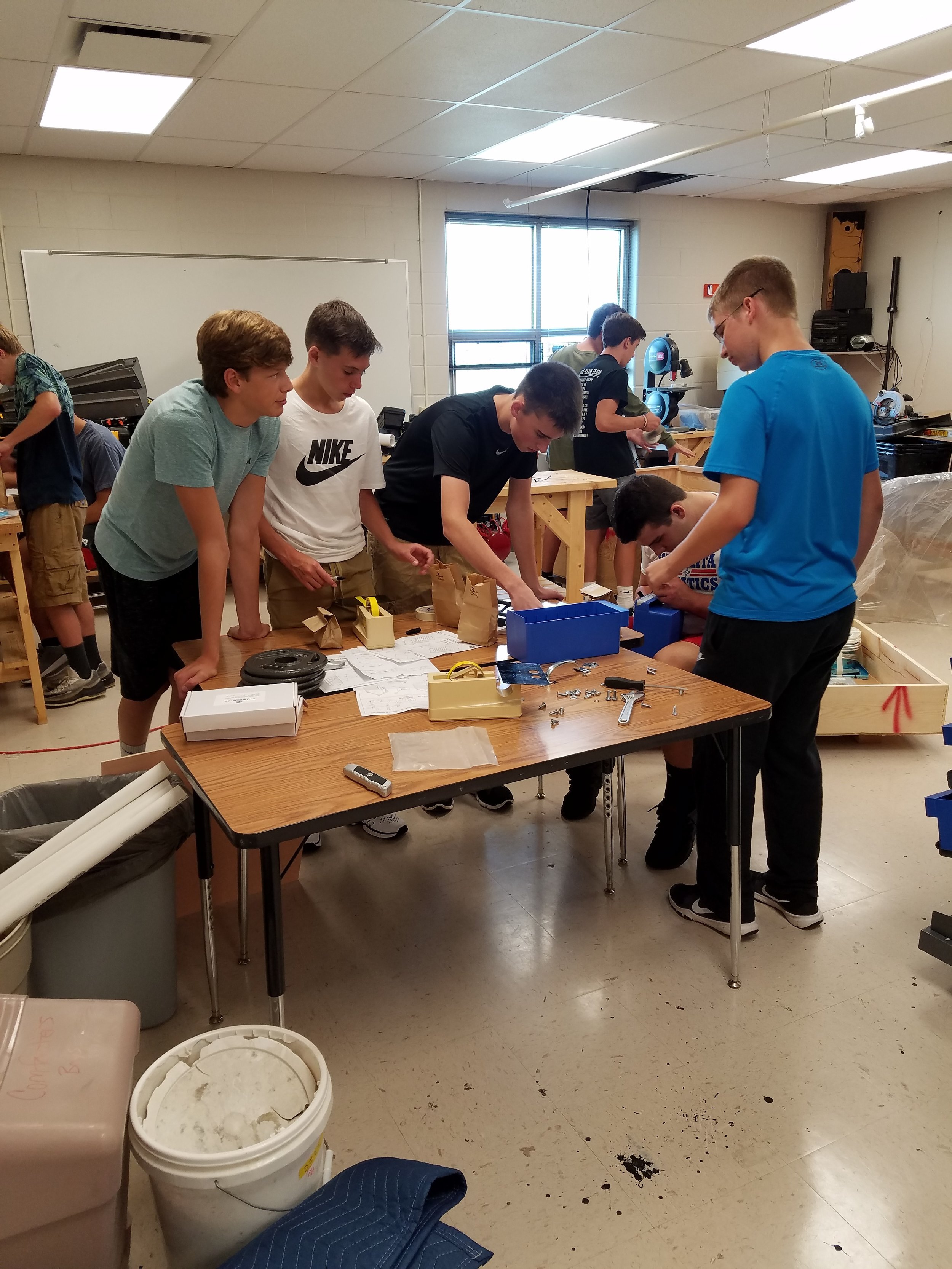 Engineering students work together on a project.