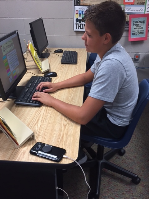 Business Communications student works on his project.