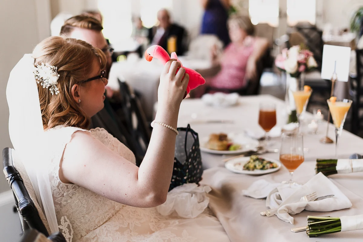 One of my favorite moments of the day was Liz’s dad’s toast. He told a story of how she had lost a favorite stuffed animal, a flamingo, at Disney World years ago as a kid. He recently was able to find it again in a lost and found, and gifted it to h