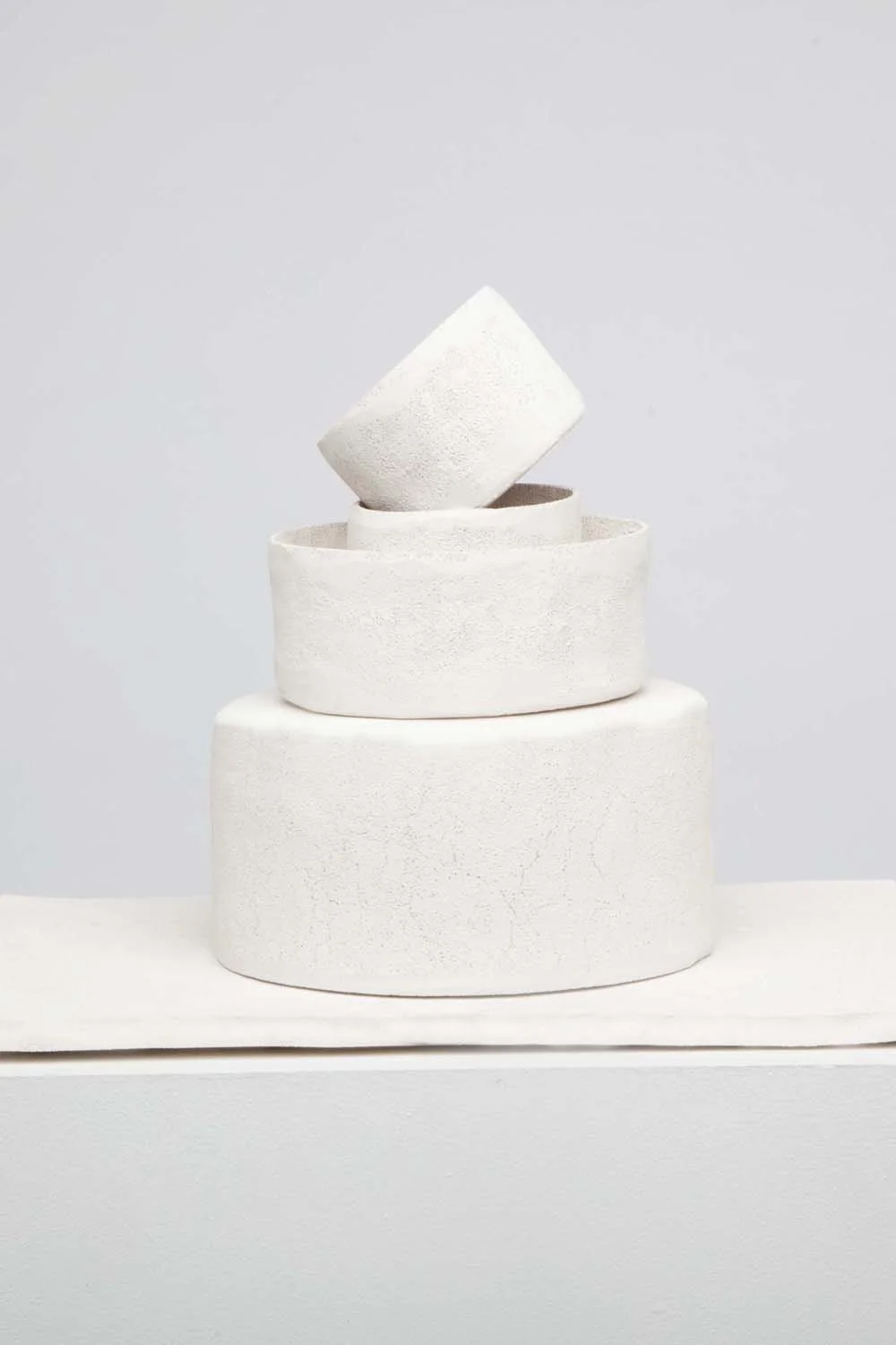 Kaibob Bowls : The Kaibab bowls are made of offcuts of sheet foam sourced from a London based matress vendor and are combined with paint. The foam functions hereby as a reinforcement for the paint, while the paint provides structure. They are named after the Kaibab Limestone found in nothern Arizona due to visual similarities.