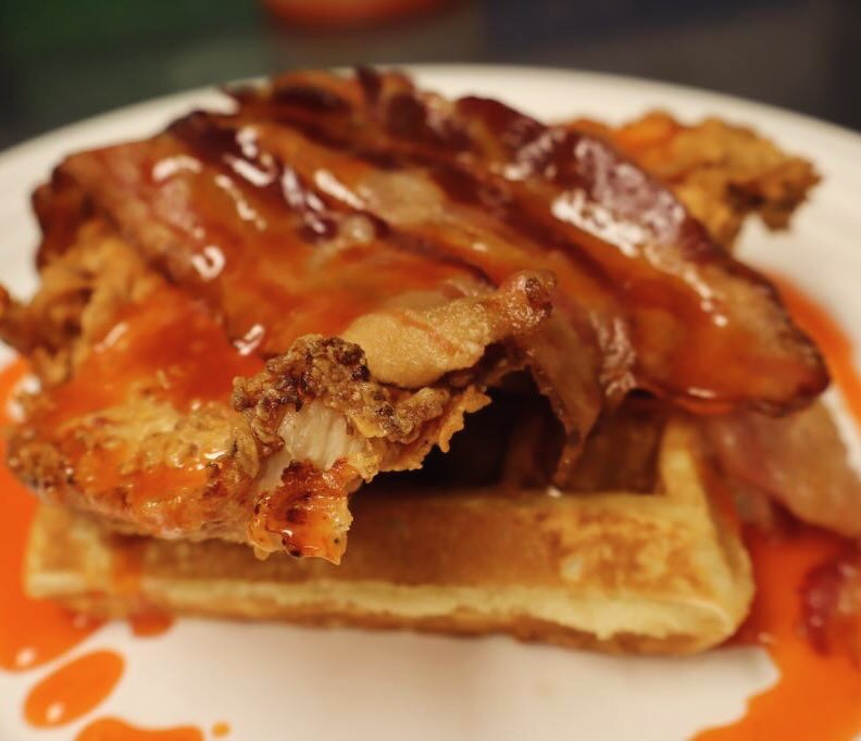 WAFFLE UP! 🐔🧇🥓🌶️

Craving a brunch that&rsquo;s both sweet &amp; savory? Look no further than our Chicken &amp; Waffles masterpiece! 🤤

We start with juicy, golden fried chicken and pair it with our fluffy, buttermilk waffles. 🏆 But that&rsquo;