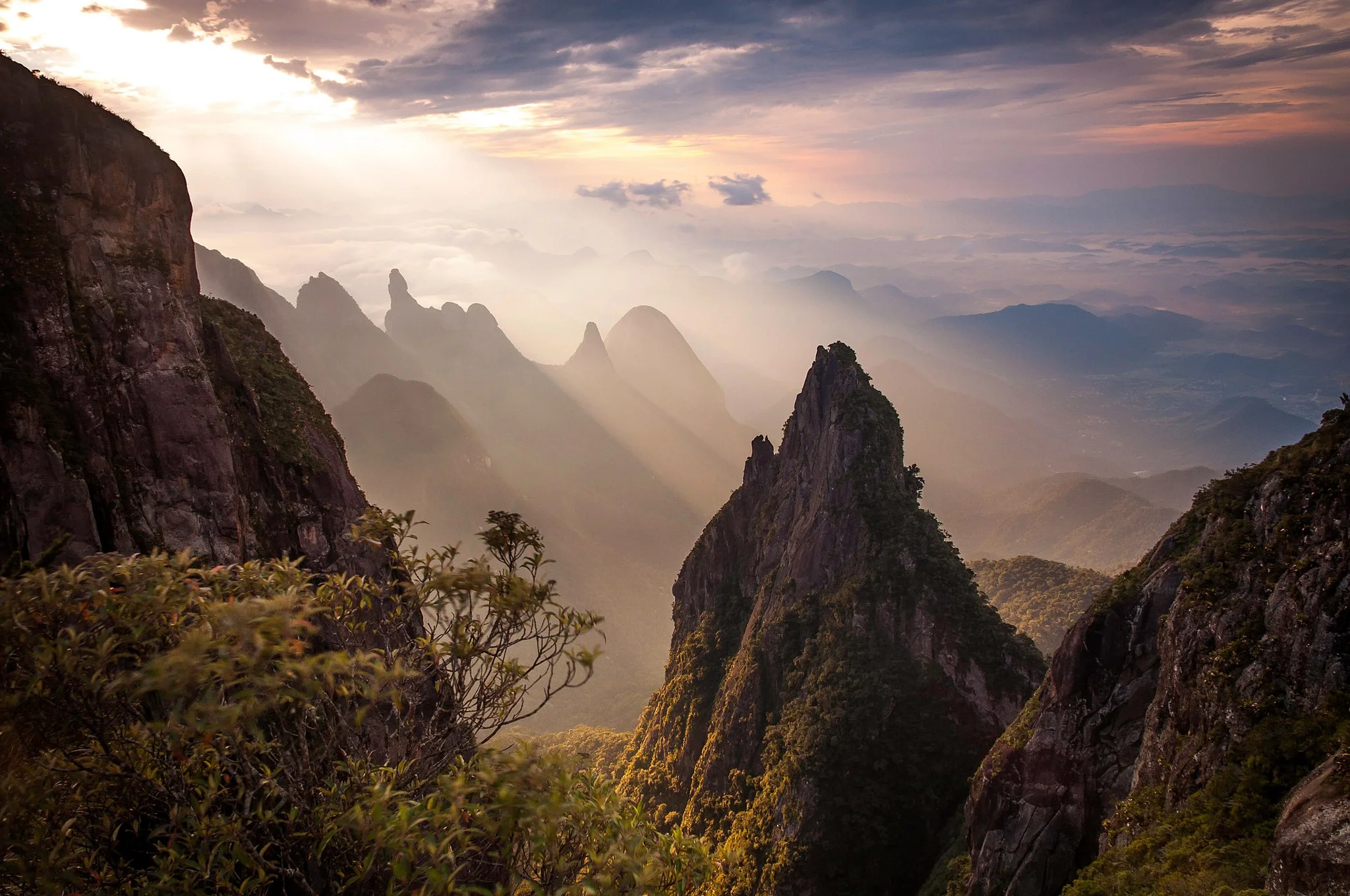 Rock formations and the Dedo de Deus (God's Finger) peak in the