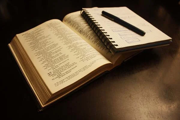 Open Bible with Notebook