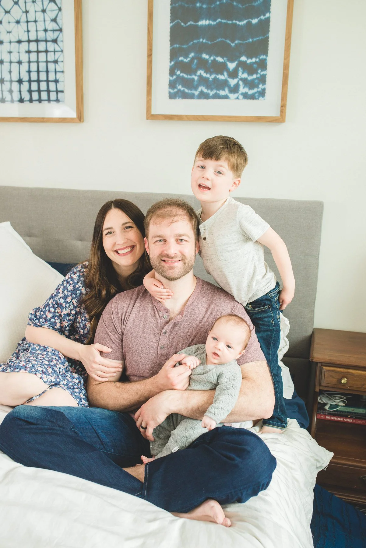 03-teresa-mansbach-parents-seated-at-home-with-their-baby-and-older-son-id-237.jpg