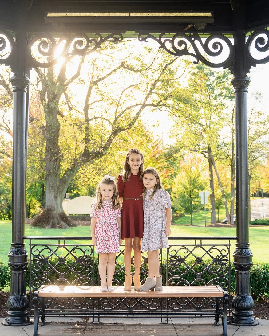 11-teresa-mansbach-two-older-sisters-standing-beneath-a-park-gazebo-id-117.jpg