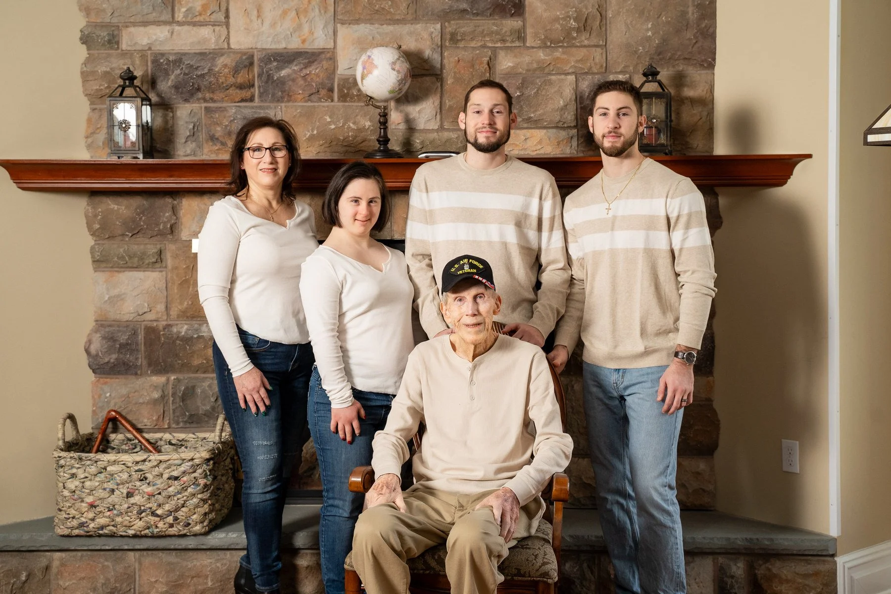 10-teresa-mansbach-family-with-older-children-gathered-by-a-fireplace-kenilworth-nj-id-079.jpg