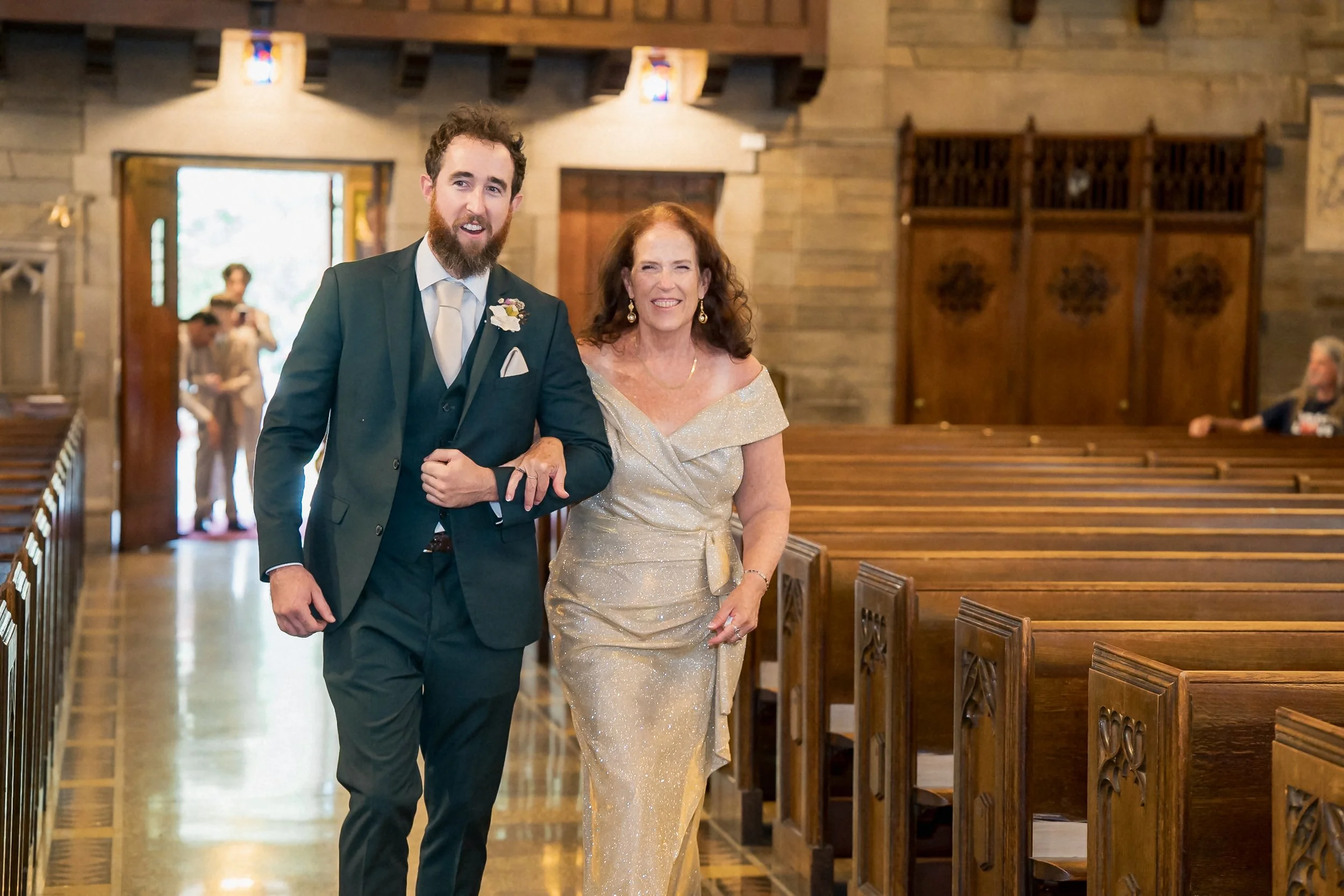 10-groom-with-mother-church-aisle-philadelphia.jpg