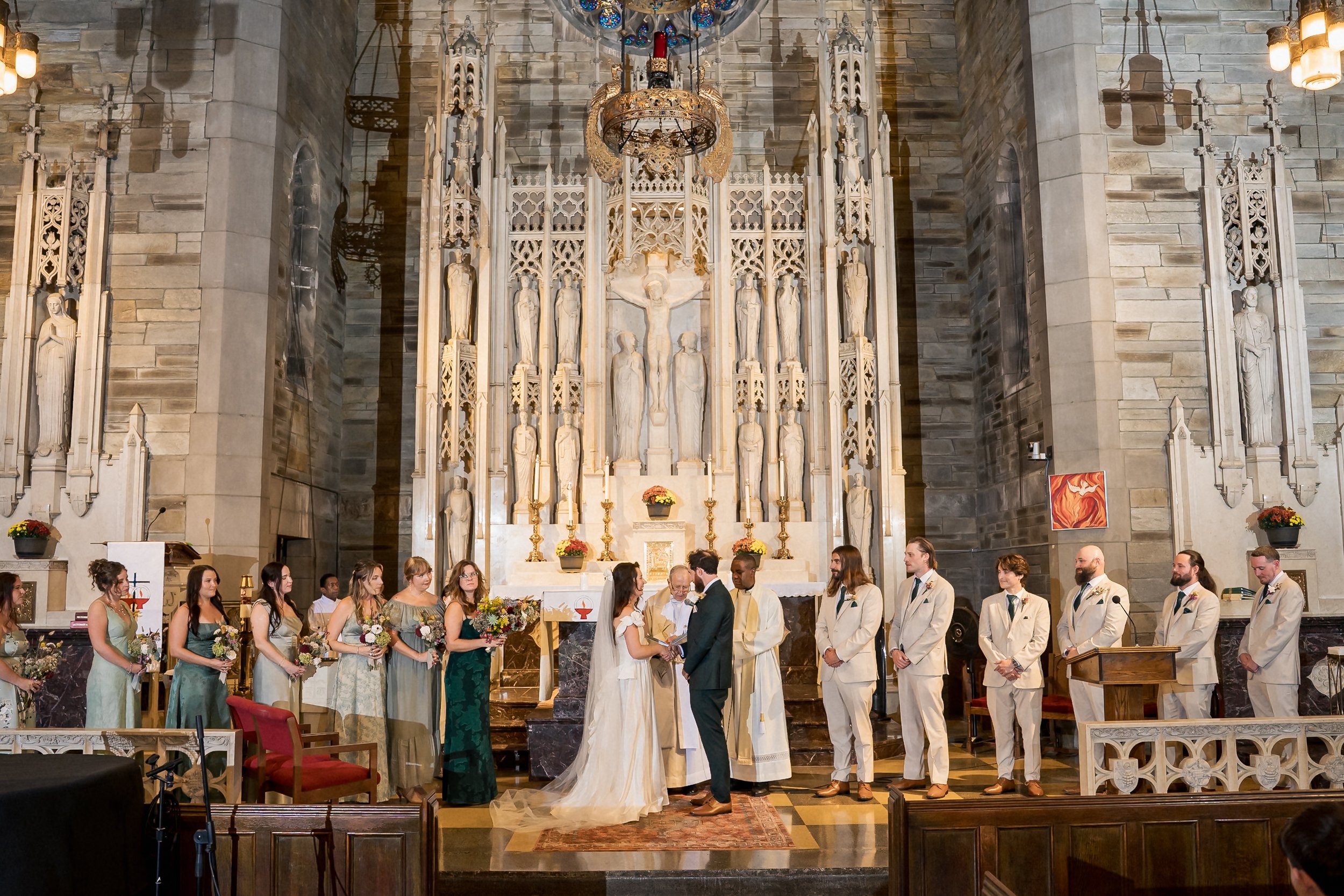 20-wedding-party-at-altar-holy-cross-philadelphia.jpg