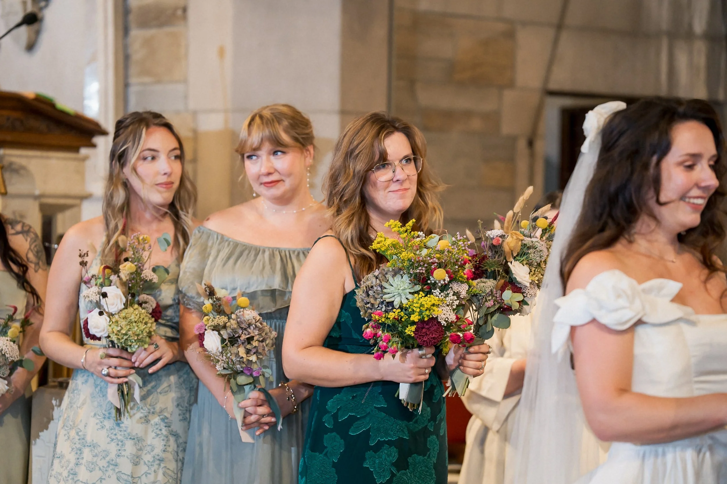 21-bridesmaids-green-dresses-during-ceremony.jpg
