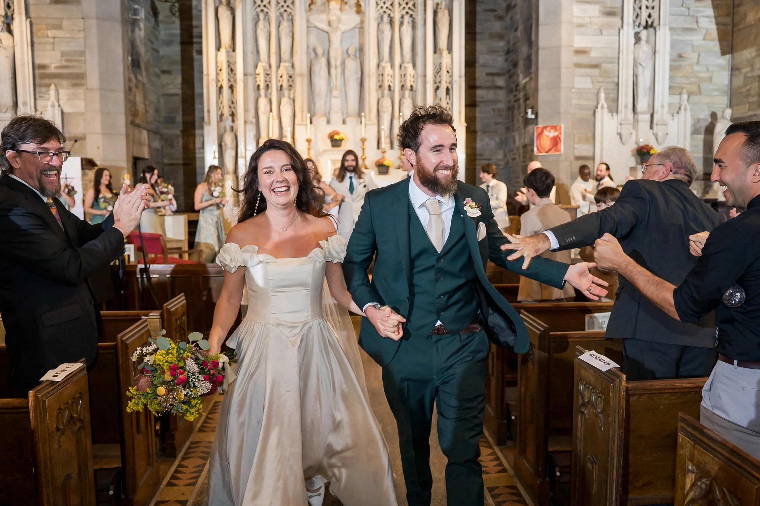 33-newlyweds-walk-down-church-aisle-philadelphia.jpg