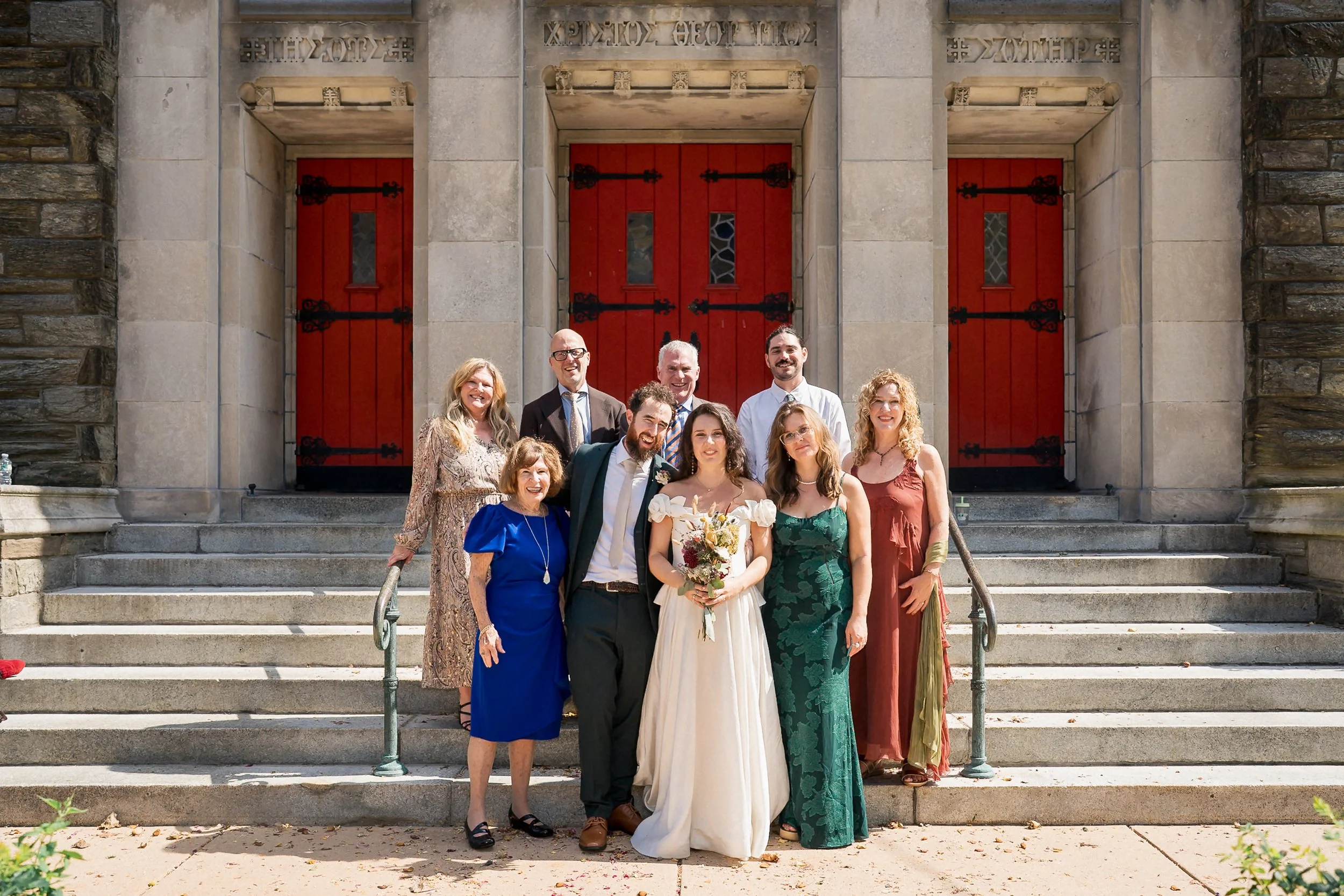 43-newlyweds-with-family-holy-cross-church.jpg