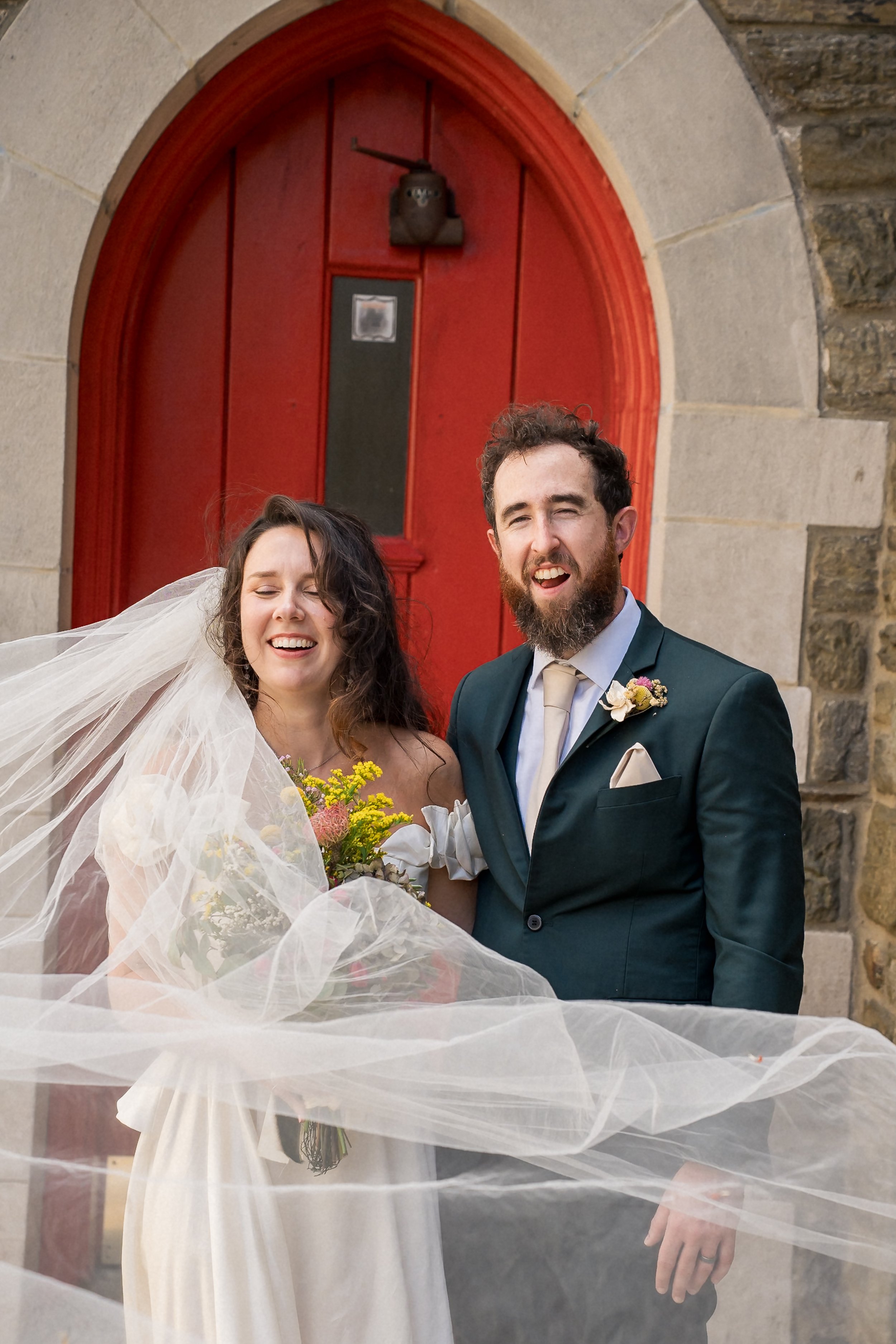 49-bride-groom-flowing-veil-portrait.jpg
