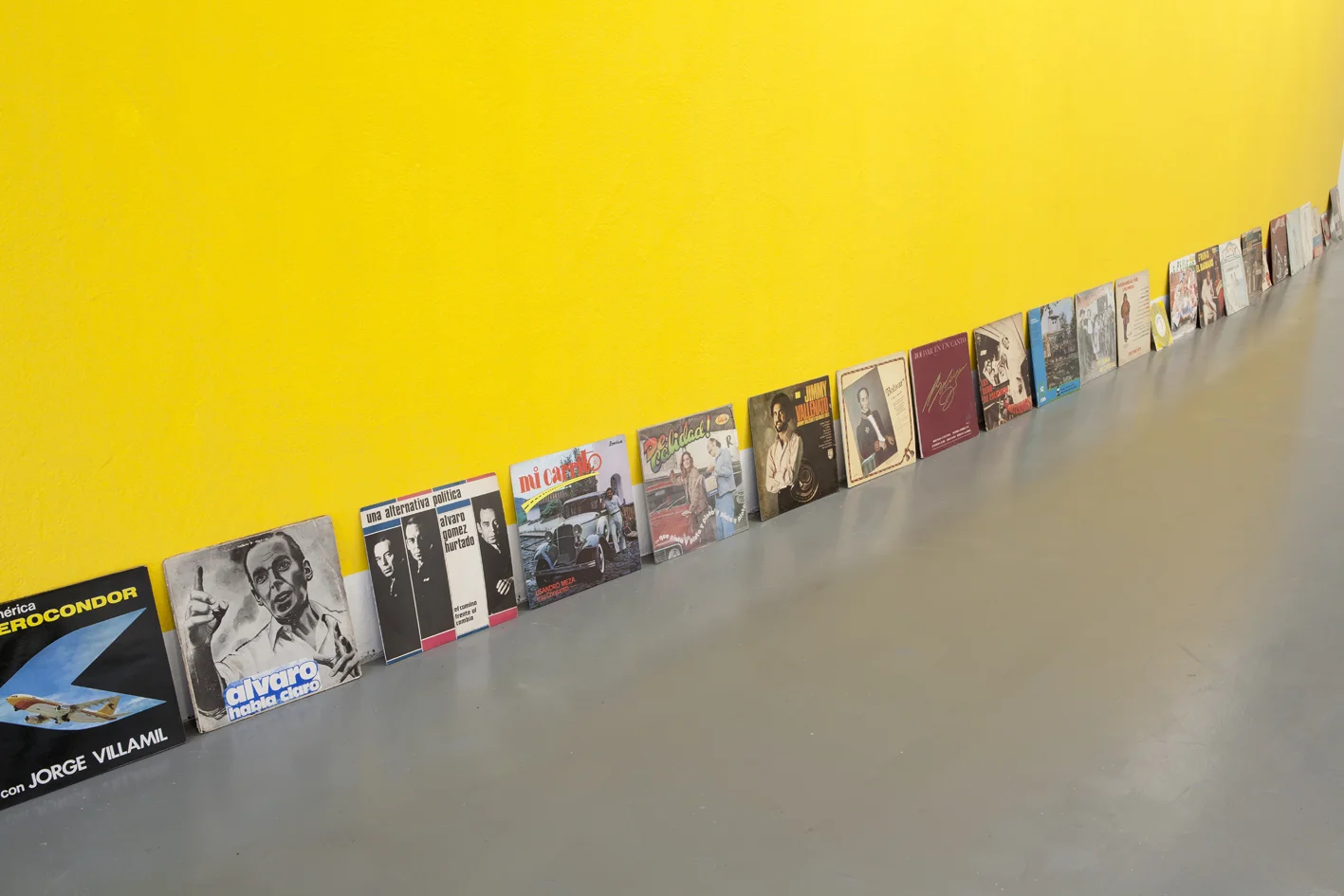 Wilson Diaz, Amarillismo 2014, Installation, yellow paint and 14 Vinyl, Various dimensions Image courtesy of the Artist and Instituto de Vision. Credits: Pablo Adarme