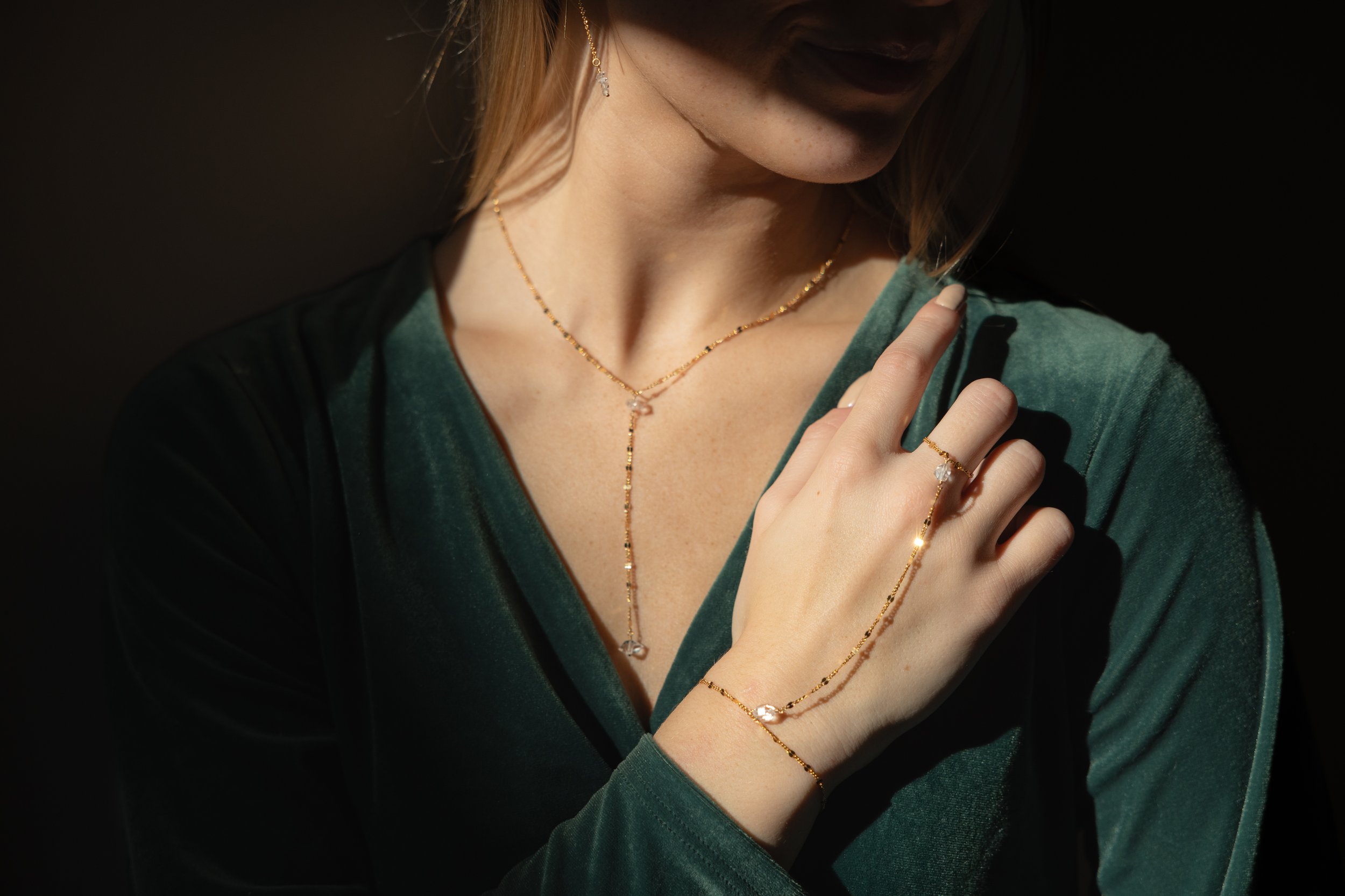 bracelet and hand chain from Token Jewelry