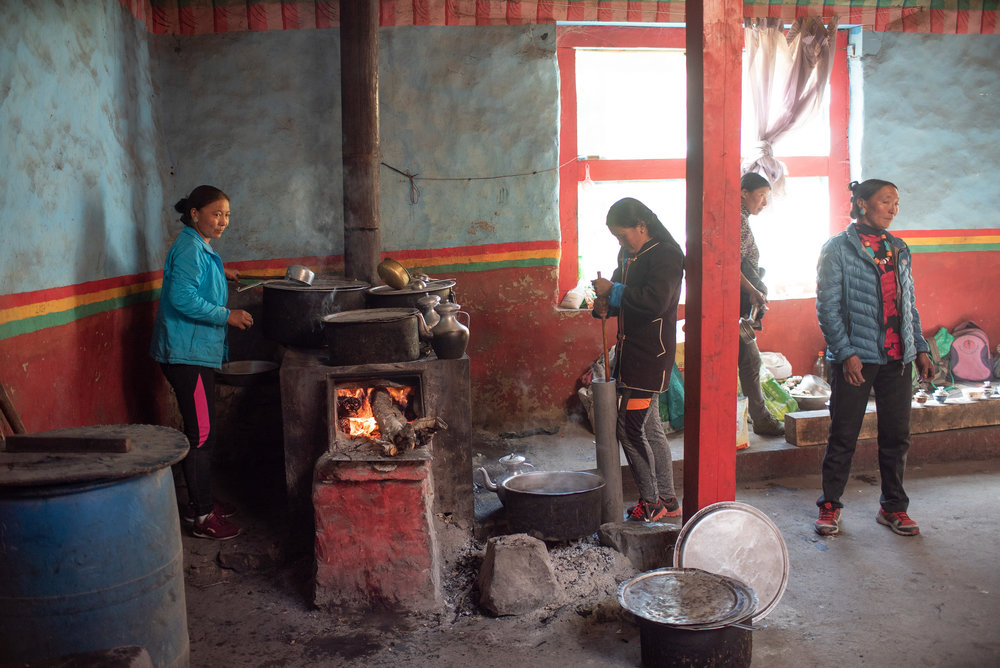 Preparing breakfast and the butter tea.