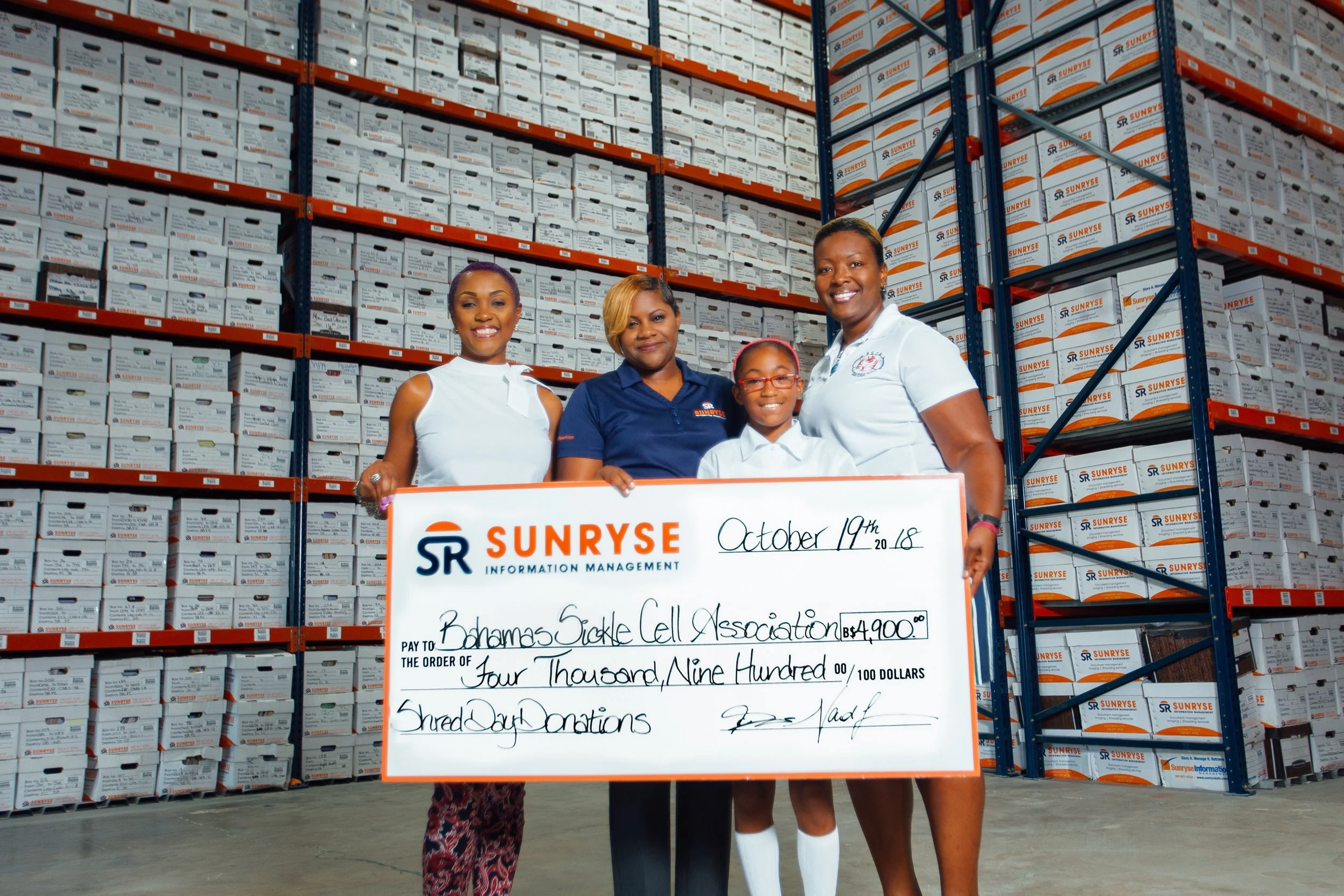 SUNRYSE SHRED DAY NETS $4900 FOR BAHAMAS SICKLE CELL FOUNDATION