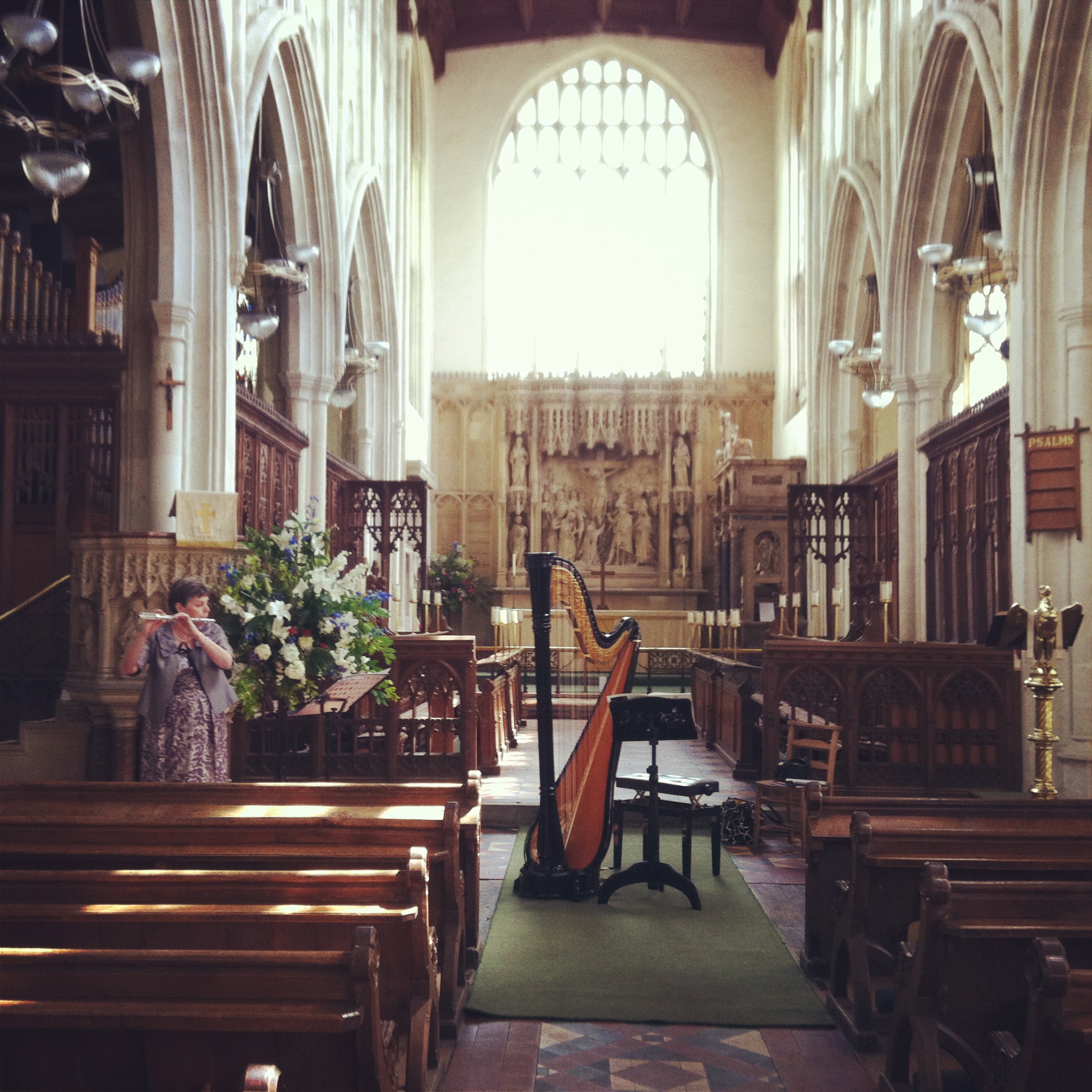 Warming up for a recital in Long Melford church with my flautist mum 