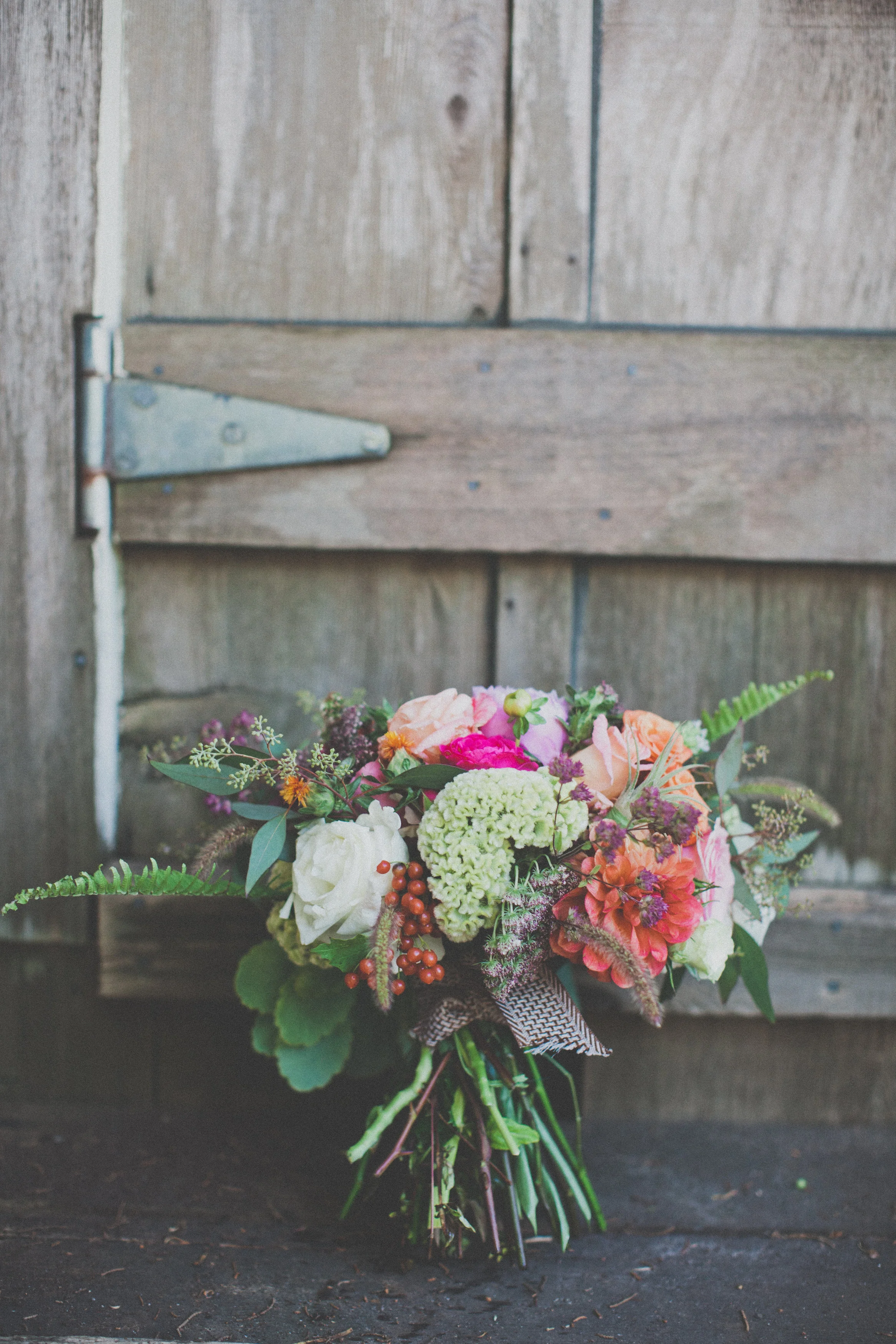 Bouquet by Kate Healey of Big Sur Flowers, featuring peonies, cabbage roses, succulents, and air plants