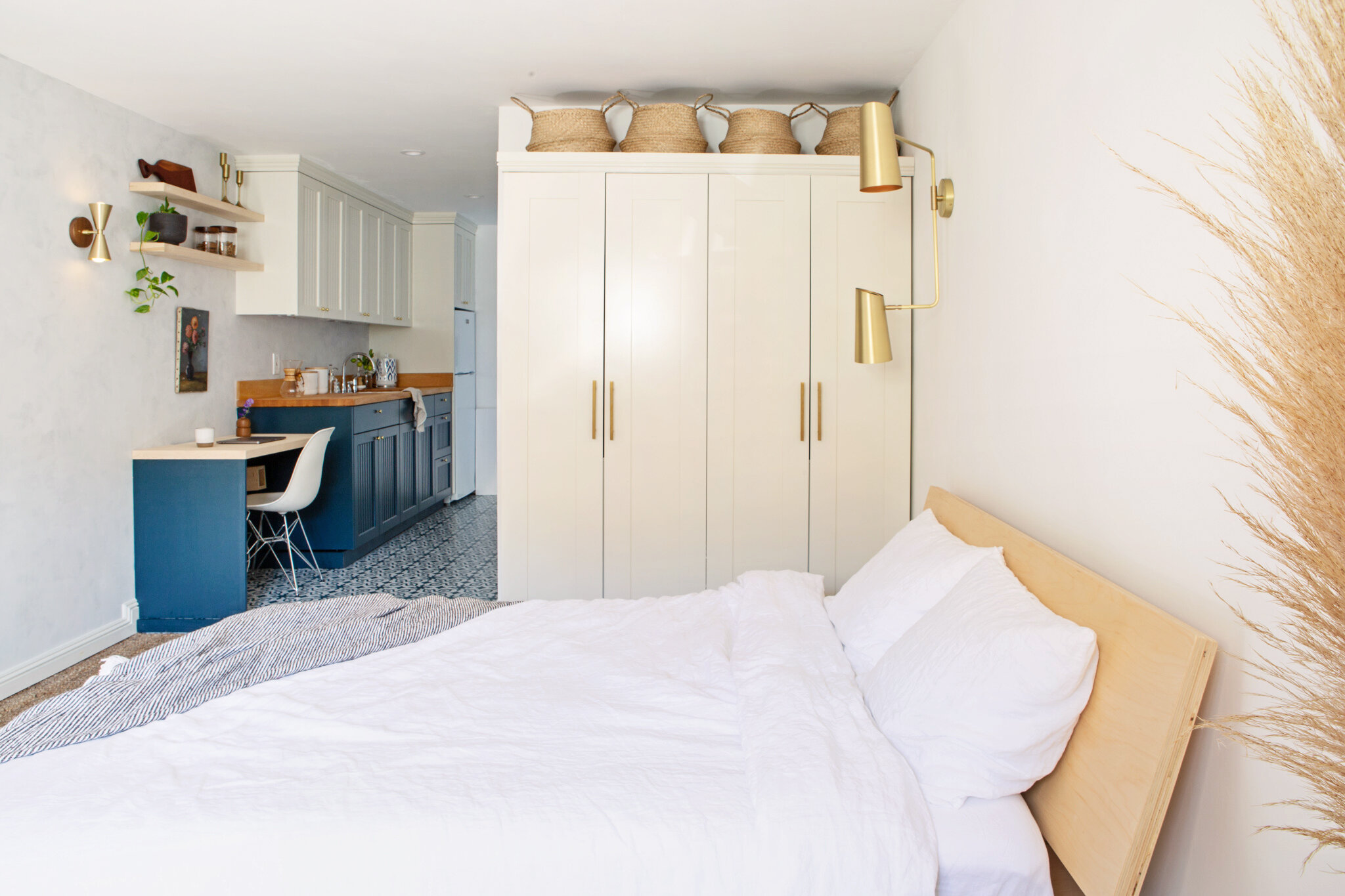  View from the sleeping area into the home office/kitchen. Nailing down the floor plan first is the key to making the most of small spaces. 