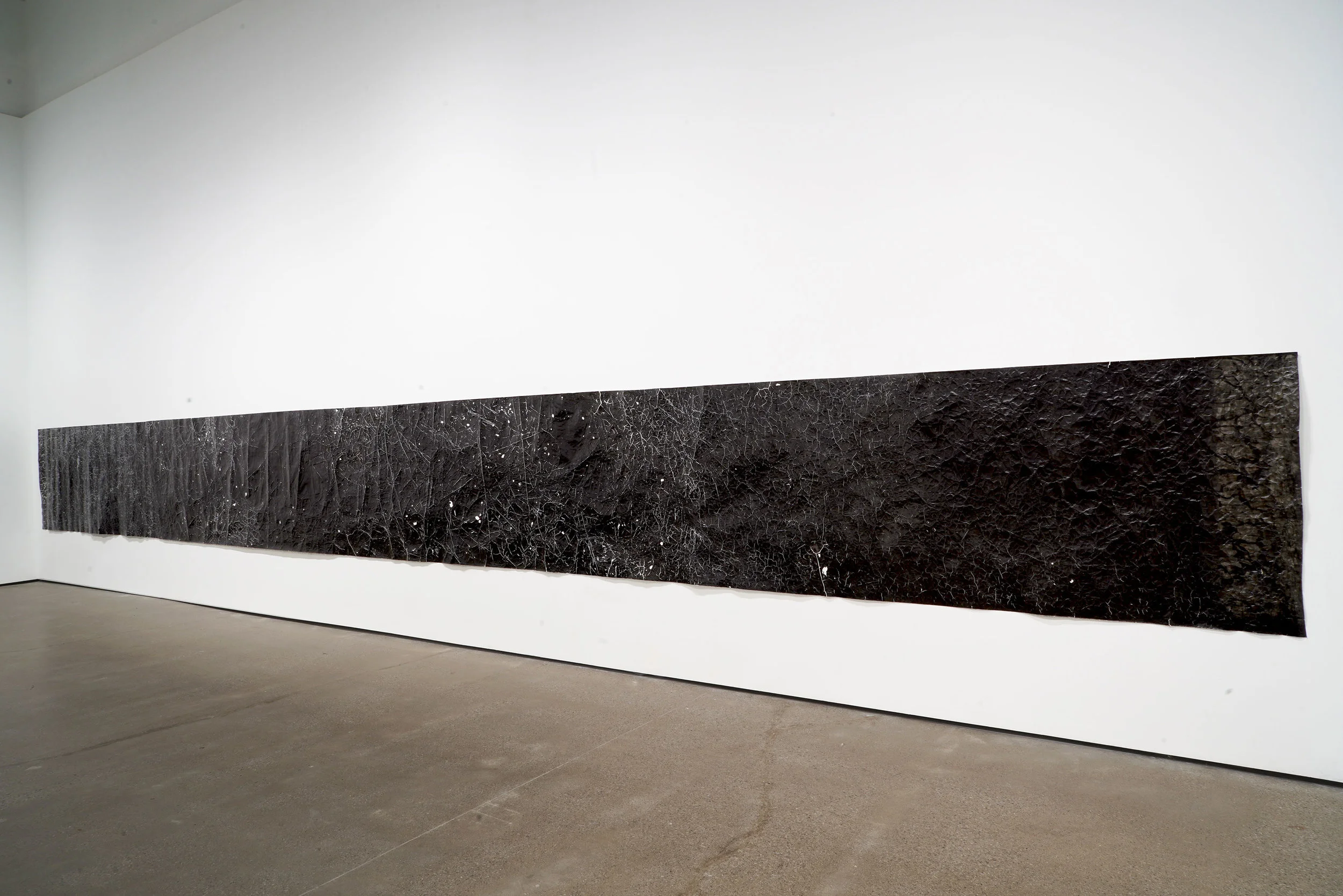 foldtogram (35'2.5' x 44"- August 2018) Iteration 1, Installation view 3 2018 35 feet- 2.5” x 44 inches x .5 inches unique silver gelatin print on full roll of 35’ x 44” Illford multigrade matte RC paper