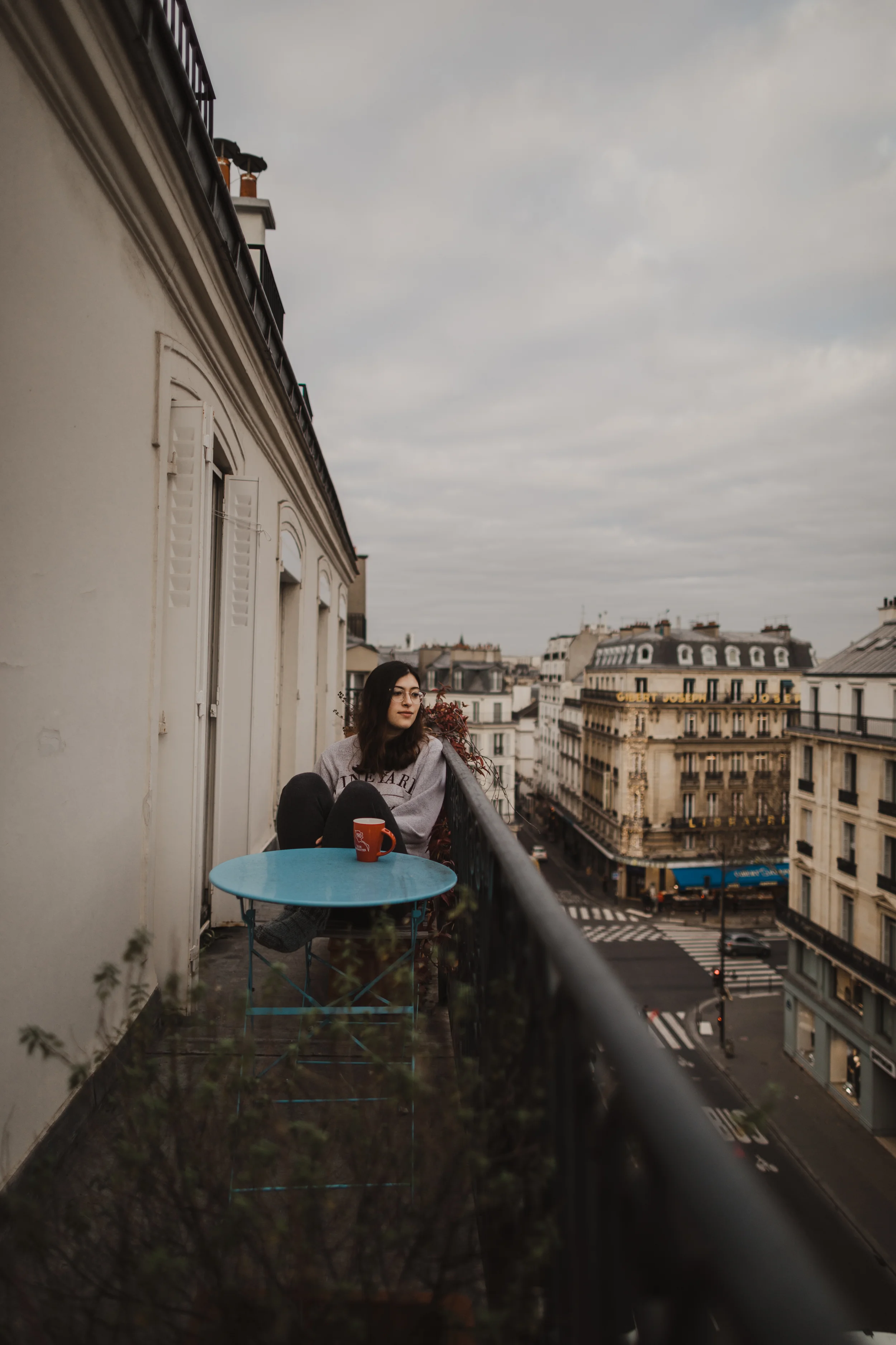 Taking my petit dej’ on my old terrace overlooking Rue Des Écoles