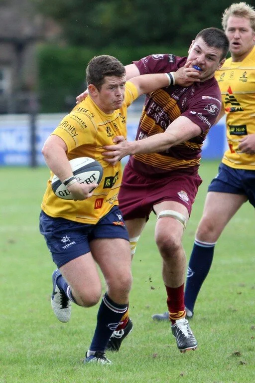 Harry Dunne Hand Off.jpg
