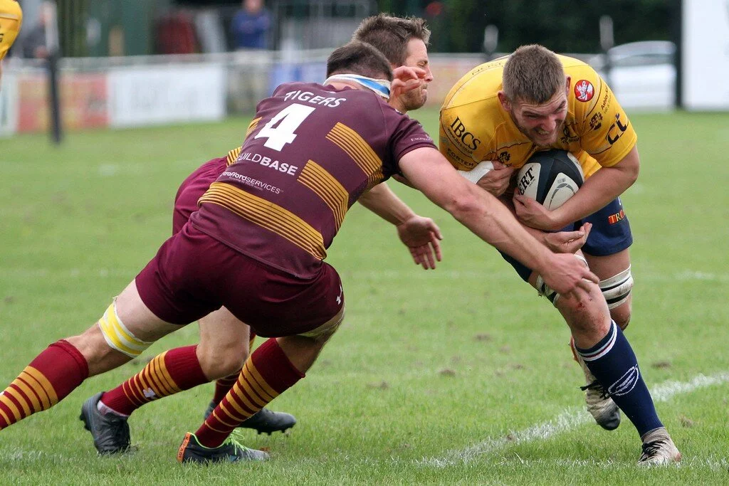 Zak Poole Braces For Impact From Robert Birtwell.jpg
