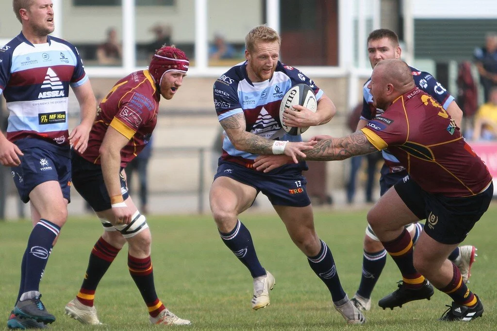 Lloyd Hayes Evades Tackle.jpg